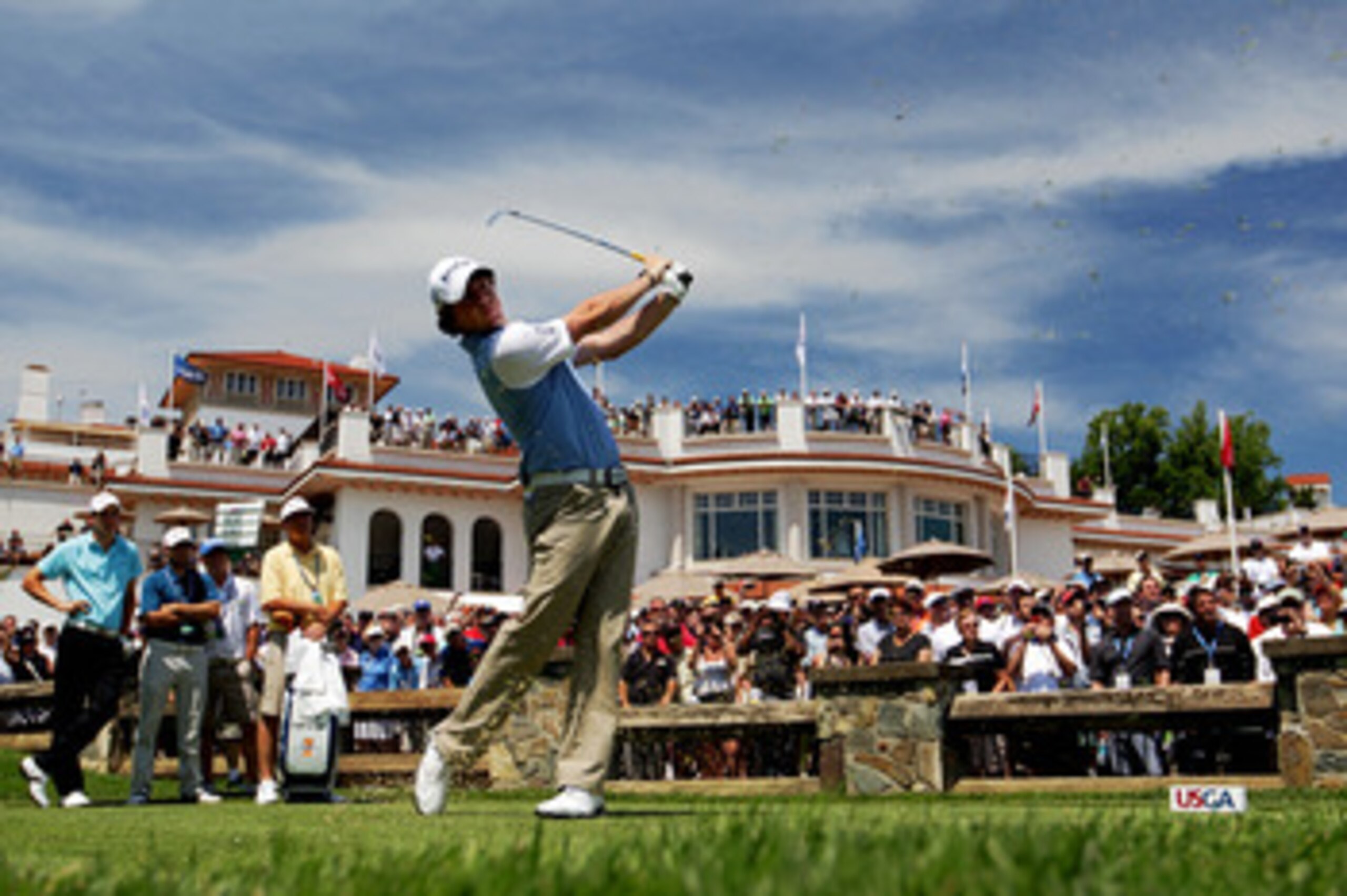 BETHESDA, MD - JUNE 15:  Rory McIlroy of Northern Ireland hits a tee shot in front of the clubhouse during a practice round prior to the start of the 111th U.S. Open at Congressional Country Club on June 15, 2011 in Bethesda, Maryland.  (Photo by Ross Kin