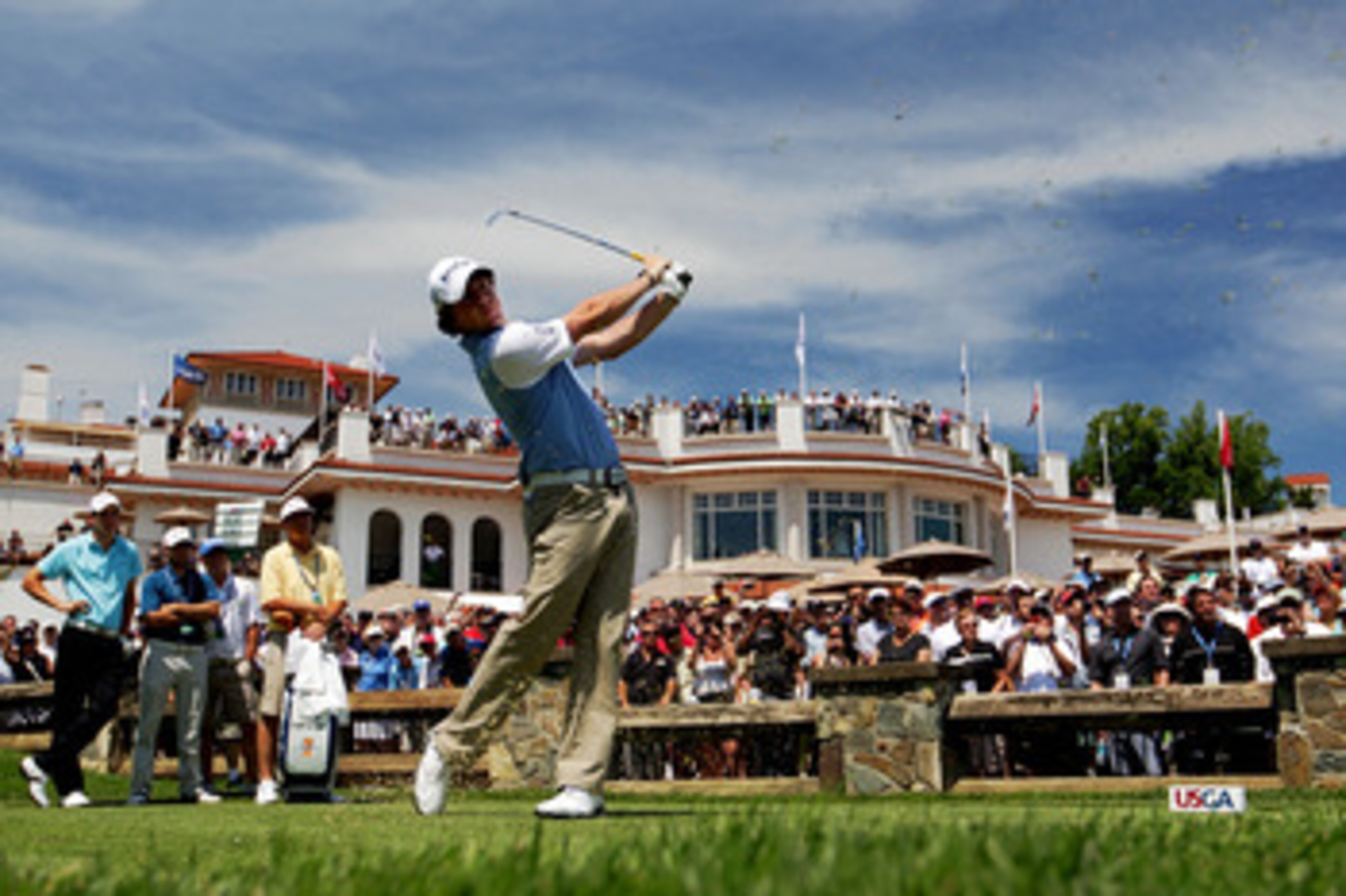 BETHESDA, MD - JUNE 15:  Rory McIlroy of Northern Ireland hits a tee shot in front of the clubhouse during a practice round prior to the start of the 111th U.S. Open at Congressional Country Club on June 15, 2011 in Bethesda, Maryland.  (Photo by Ross Kin
