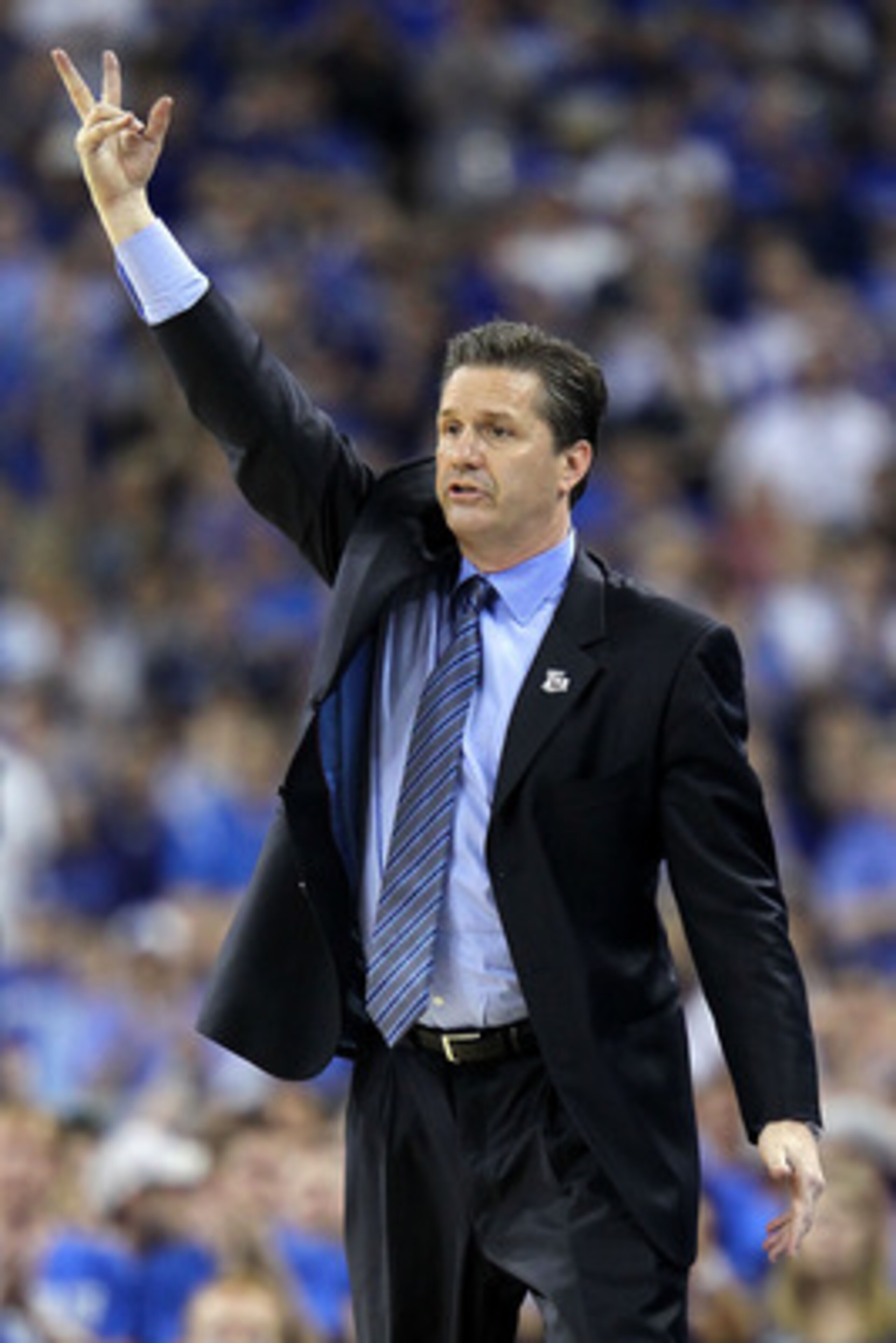 HOUSTON, TX - APRIL 02:  Head coach John Calipari of the Kentucky Wildcats reacts from the sidelines against the Connecticut Huskies during the National Semifinal game of the 2011 NCAA Division I Men's Basketball Championship at Reliant Stadium on April 2