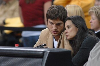 IOWA CITY, IA - DECEMBER 12: Actors Ashton Kutcher and wife Demi Moore watch the second half of the game during the Iowa-Iowa State college basketball game on December 12, 2008 at the University of Iowa in Iowa City, Iowa. Johnson and Kutcher, both from IOWA CITY, IA - DECEMBER 12: Actors Ashton Kutcher and wife Demi Moore watch the second half of the game during the Iowa-Iowa State college basketball game on December 12, 2008 at the University of Iowa in Iowa City, Iowa. Johnson and Kutcher, both from