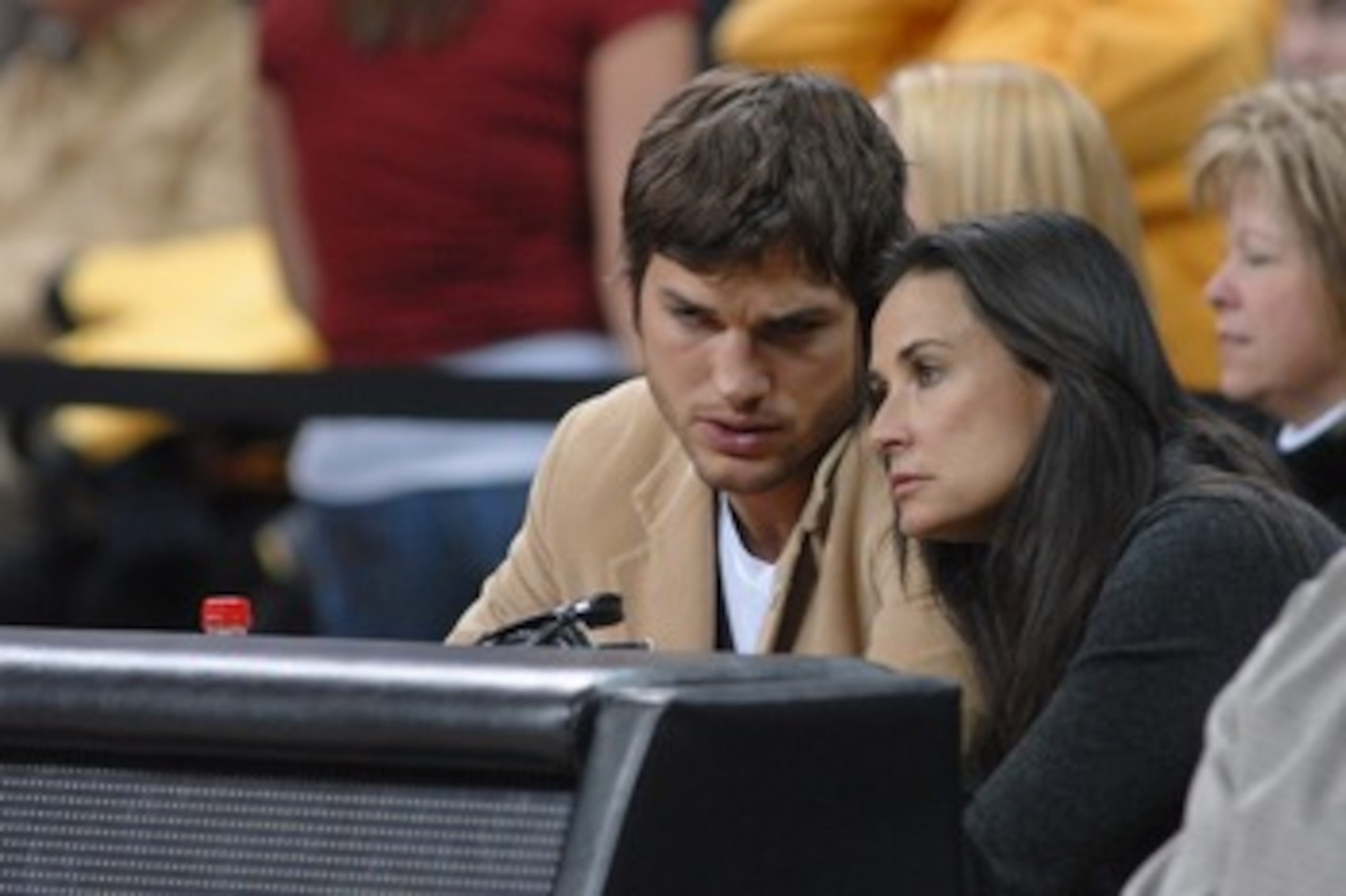 IOWA CITY, IA - DECEMBER 12:  Actors Ashton Kutcher and wife Demi Moore watch the second half of the game during the Iowa-Iowa State college basketball game on December 12, 2008 at the University of Iowa in Iowa City, Iowa. Johnson and Kutcher, both from 