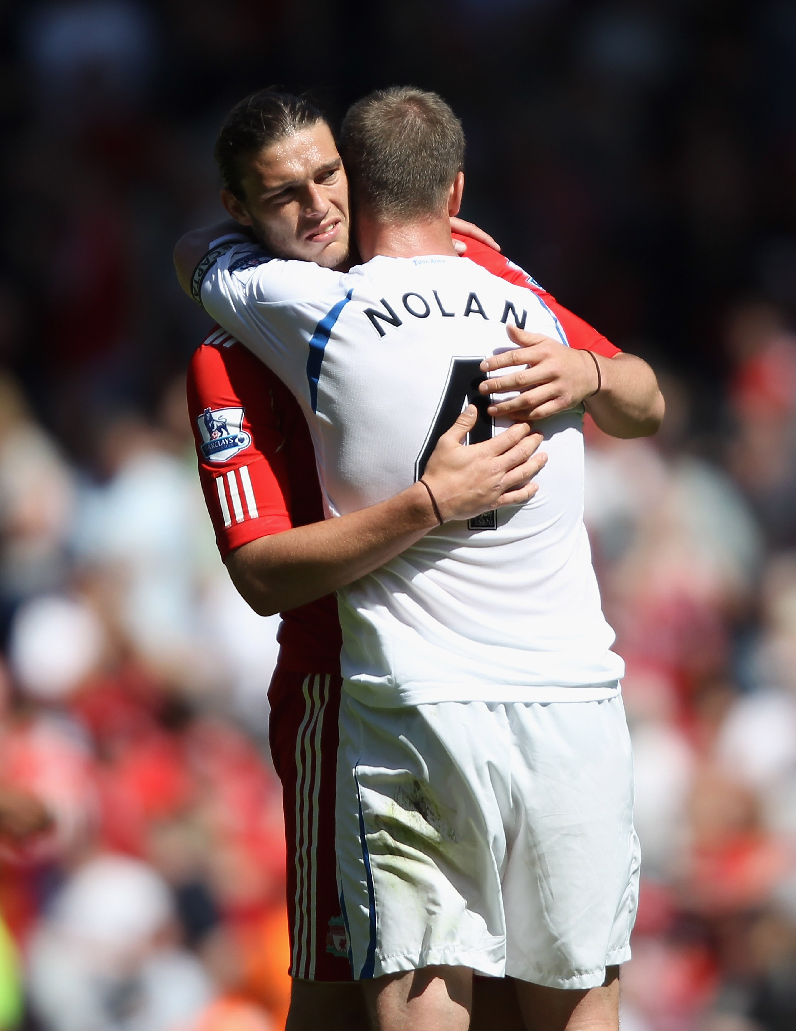 LIVERPOOL, ENGLAND - MAY 01: Andy Carroll of Liverpool hugs Kevin Nolan of Newcastle United at the final whistle of the Barclays Premier League match between Liverpool and Newcastle United at Anfield on May 1, 2011 in Liverpool, England. (Photo by Cliv LIVERPOOL, ENGLAND - MAY 01: Andy Carroll of Liverpool hugs Kevin Nolan of Newcastle United at the final whistle of the Barclays Premier League match between Liverpool and Newcastle United at Anfield on May 1, 2011 in Liverpool, England. (Photo by Cliv