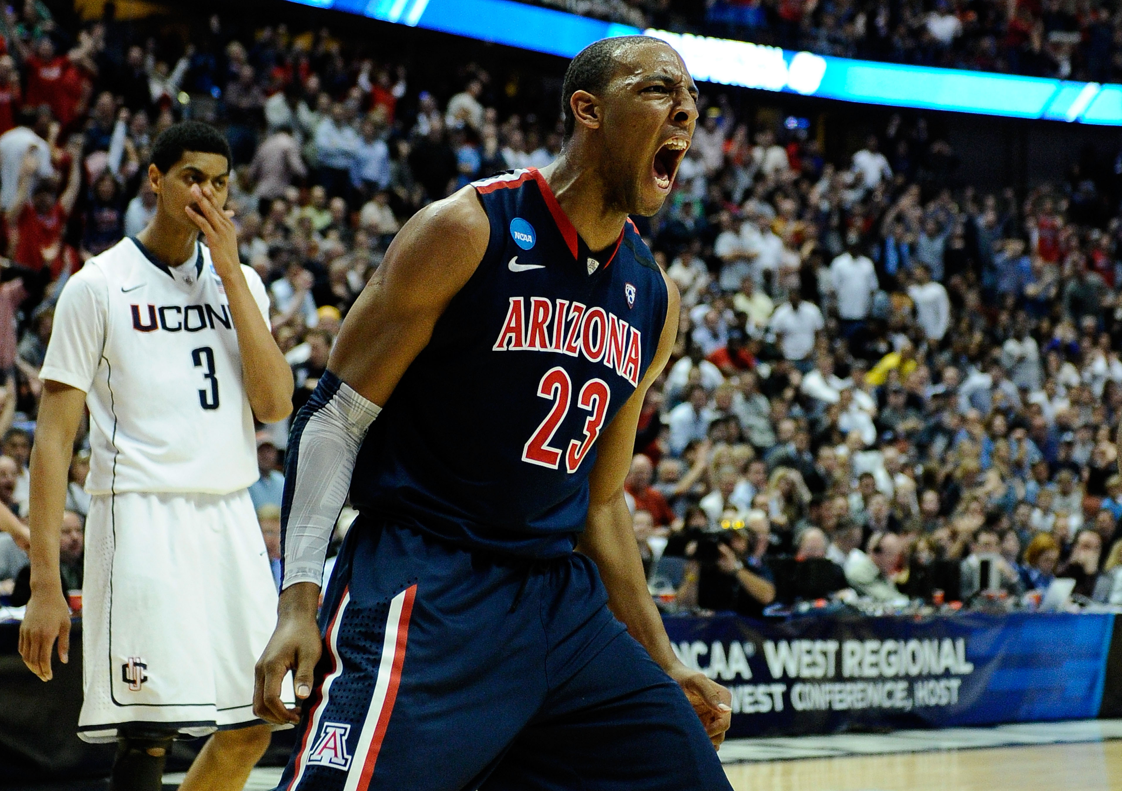 ANAHEIM, CA - MARCH 26: Derrick Williams #23 of the Arizona Wildcats reacts after a dunk against of the Connecticut Huskies during the west regional final of the 2011 NCAA men's basketball tournament at the Honda Center on March 26, 2011 in Anaheim, Cali ANAHEIM, CA - MARCH 26: Derrick Williams #23 of the Arizona Wildcats reacts after a dunk against of the Connecticut Huskies during the west regional final of the 2011 NCAA men's basketball tournament at the Honda Center on March 26, 2011 in Anaheim, Cali