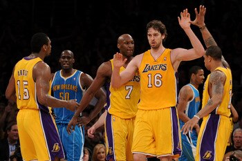 LOS ANGELES, CA - APRIL 26:  Pau Gasol #16 of the Los Angeles Lakers reacts in the third quarter with teammates Ron Artest #15 and Shannon Brown #12 while taking on the New Orleans Hornets in Game Five of the Western Conference Quarterfinals in the 2011 N