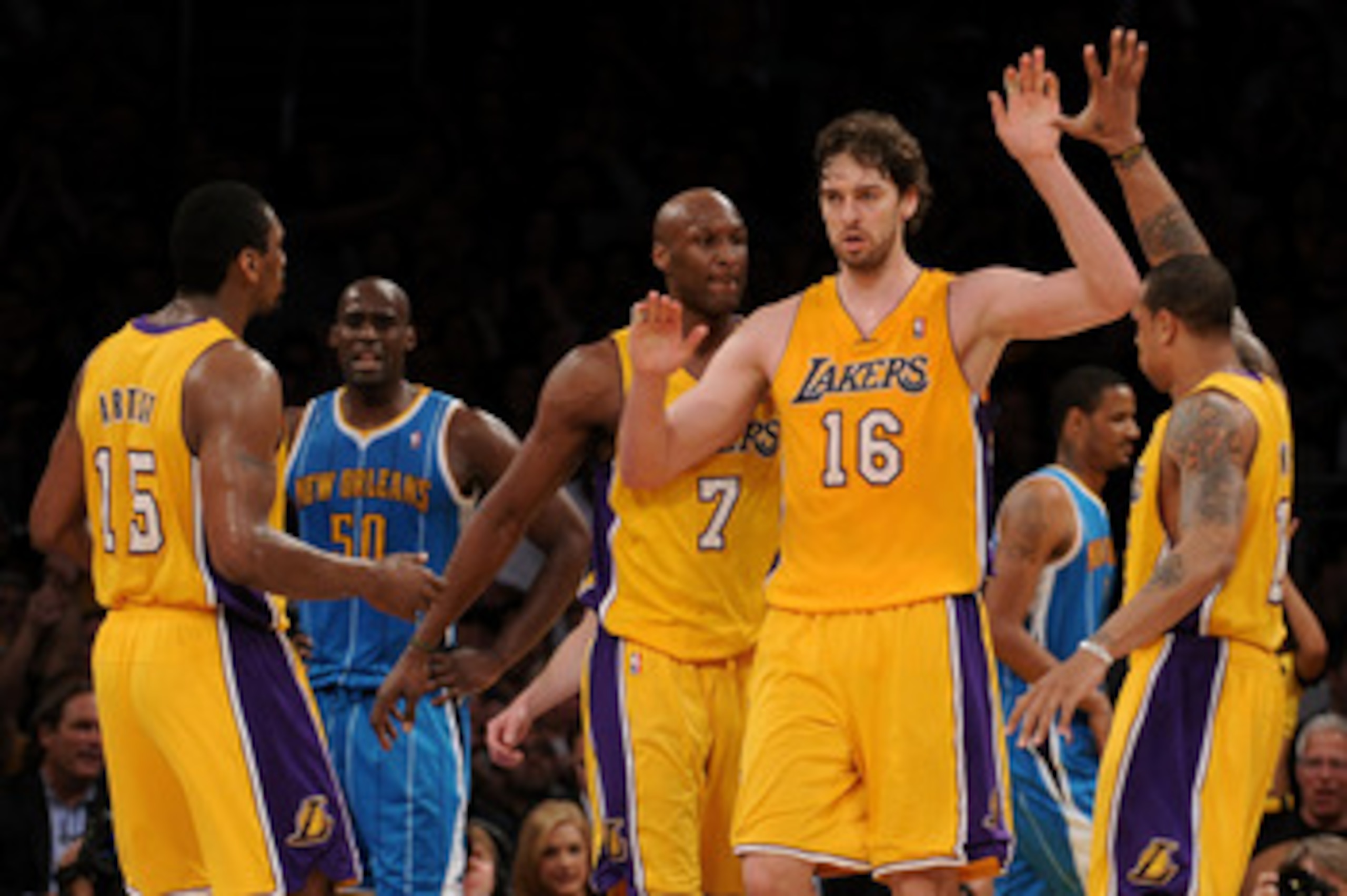 LOS ANGELES, CA - APRIL 26:  Pau Gasol #16 of the Los Angeles Lakers reacts in the third quarter with teammates Ron Artest #15 and Shannon Brown #12 while taking on the New Orleans Hornets in Game Five of the Western Conference Quarterfinals in the 2011 N