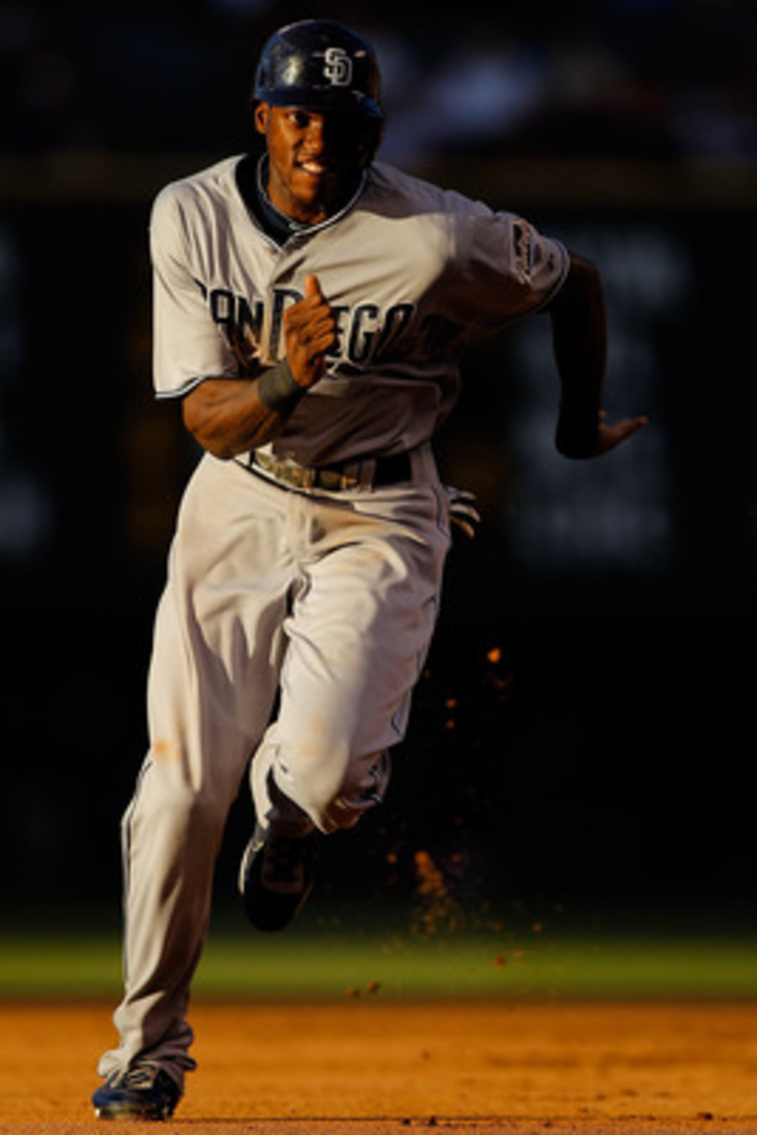 DENVER, CO - JUNE 14: Cameron Maybin #24 of the San Diego Padres runs towards third base on his way to score on a double by teammate Alberto Gonzalez during the fourth inning at Coors Field on June 14, 2011 in Denver, Colorado. (Photo by Justin Edmonds/G DENVER, CO - JUNE 14: Cameron Maybin #24 of the San Diego Padres runs towards third base on his way to score on a double by teammate Alberto Gonzalez during the fourth inning at Coors Field on June 14, 2011 in Denver, Colorado. (Photo by Justin Edmonds/G