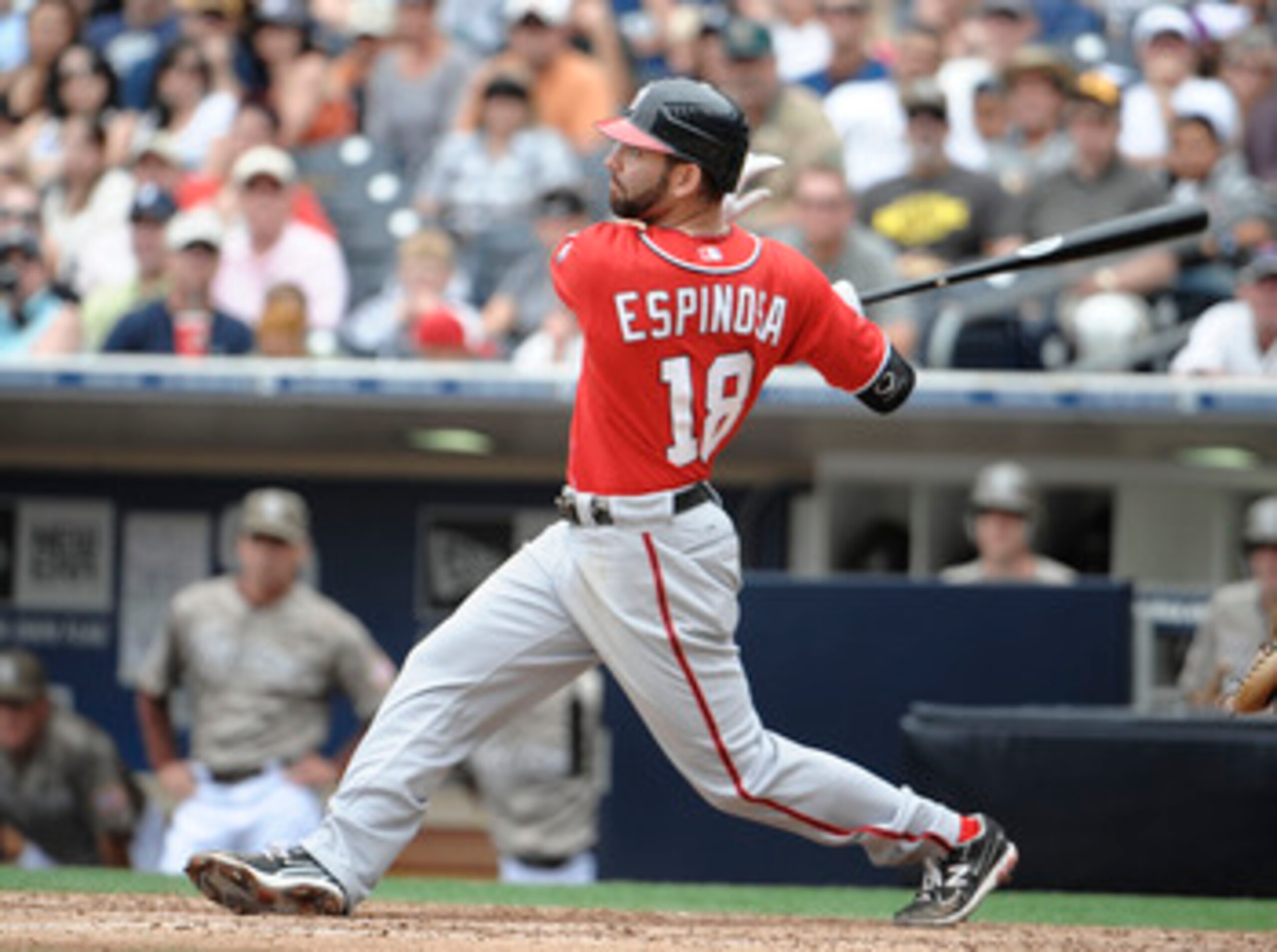 SAN DIEGO, CA - JUNE 12: Danny Espinosa #18 of the Washington Nationals hits a sacrifice fly during the ninth inning of a baseball game against the San Diego Padres at Petco Park on June 12, 2011 in San Diego, California. The Nationals won 2-0. (Photo by SAN DIEGO, CA - JUNE 12: Danny Espinosa #18 of the Washington Nationals hits a sacrifice fly during the ninth inning of a baseball game against the San Diego Padres at Petco Park on June 12, 2011 in San Diego, California. The Nationals won 2-0. (Photo by