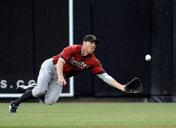 SAN DIEGO, CA-JUNE 2: Hunter Pence #9 of the Houston Astros makes a diving catch on a ball hit by Ryan Ludwick #47 of the San Diego Padres during the first inning of a baseball game at Petco Park on June 2, 2011 in San Diego, California. (Photo by Denis SAN DIEGO, CA-JUNE 2: Hunter Pence #9 of the Houston Astros makes a diving catch on a ball hit by Ryan Ludwick #47 of the San Diego Padres during the first inning of a baseball game at Petco Park on June 2, 2011 in San Diego, California. (Photo by Denis