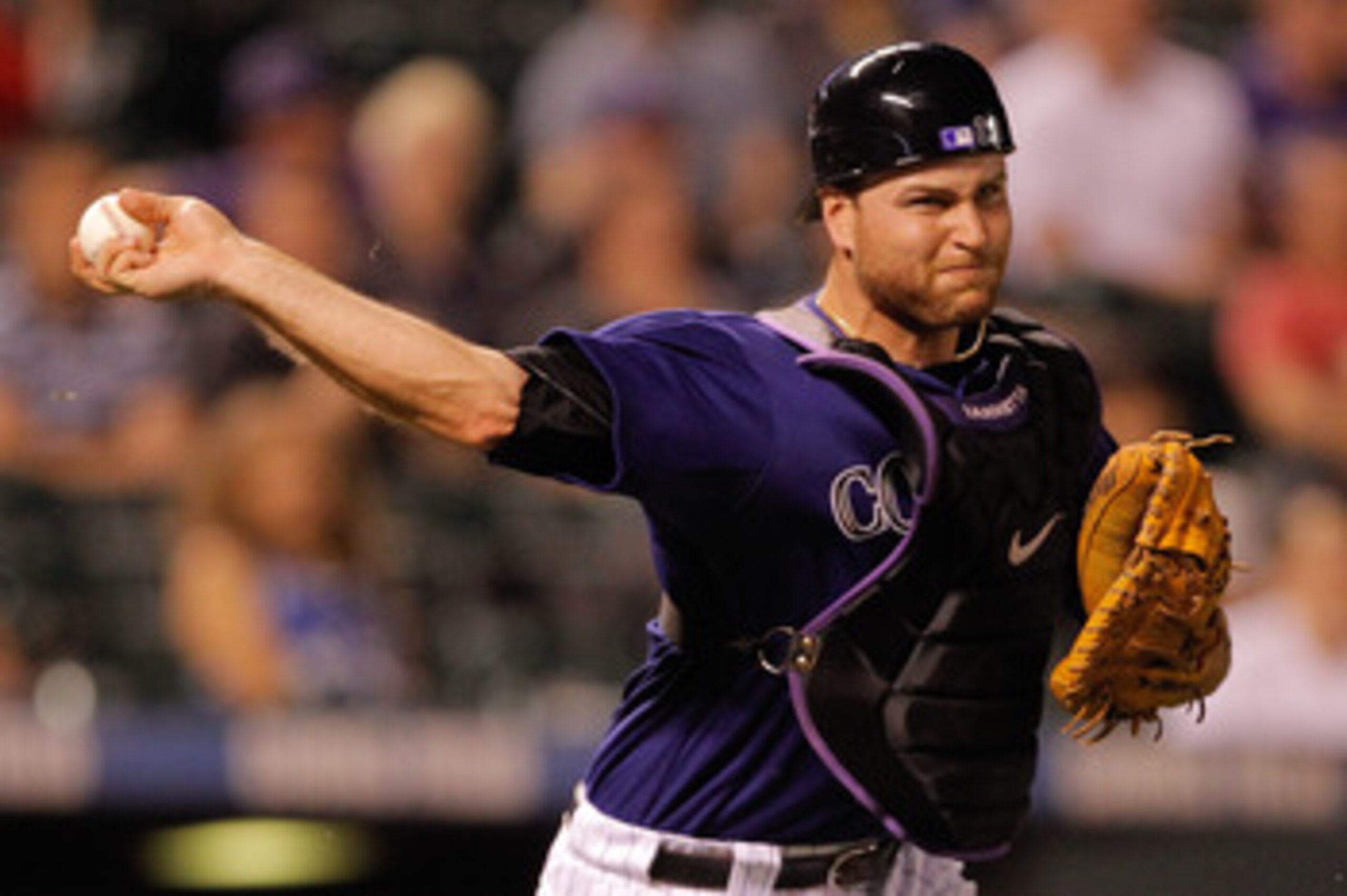 DENVER, CO - JUNE 13: Catcher Chris Iannetta #20 of the Colorado Rockies throws out Jason Bartlett #8 of the San Diego Padres on a sacrafice bunt at Coors Field on June 13, 2011 in Denver, Colorado. (Photo by Justin Edmonds/Getty Images) DENVER, CO - JUNE 13: Catcher Chris Iannetta #20 of the Colorado Rockies throws out Jason Bartlett #8 of the San Diego Padres on a sacrafice bunt at Coors Field on June 13, 2011 in Denver, Colorado. (Photo by Justin Edmonds/Getty Images)