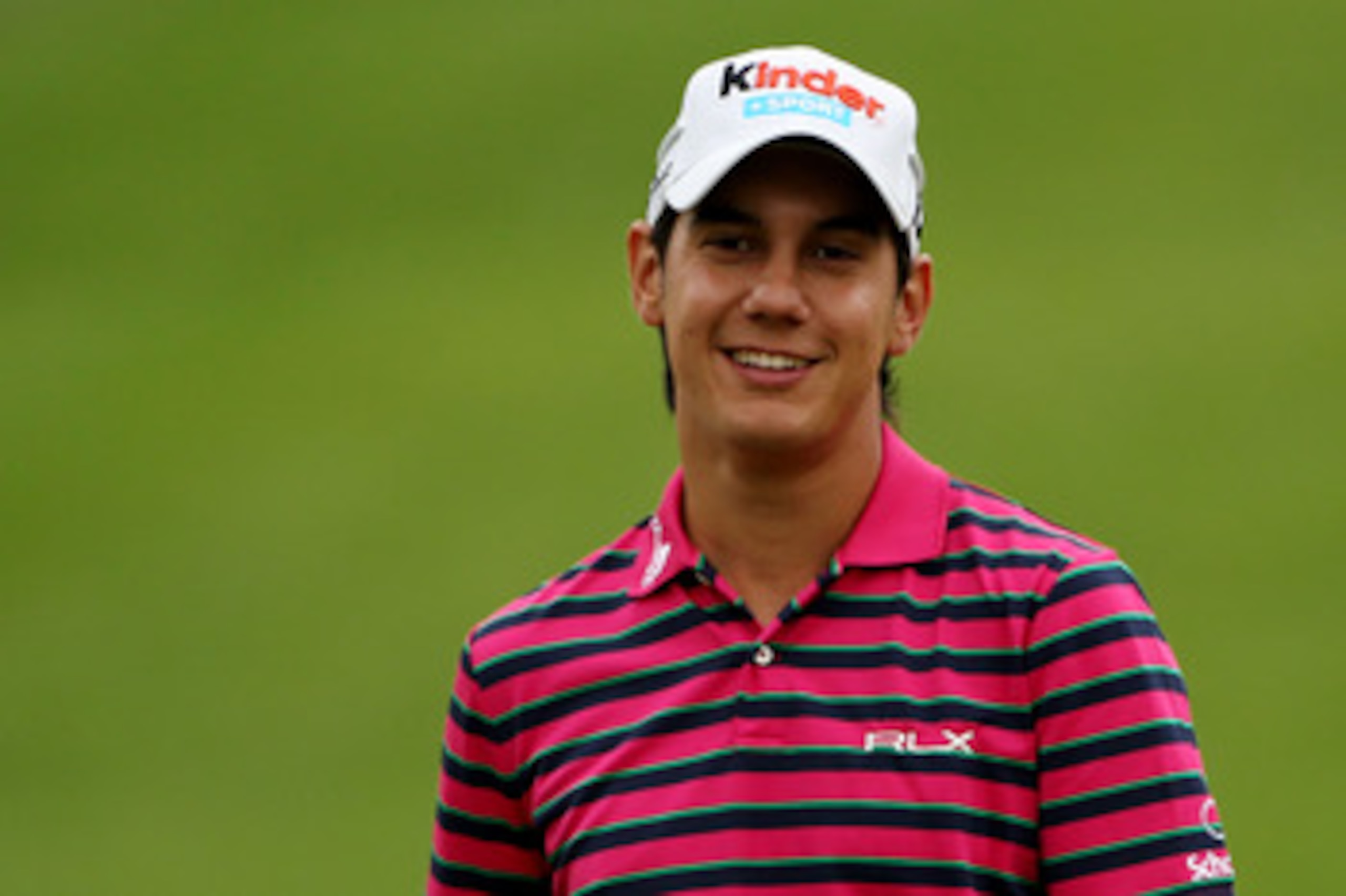 BETHESDA, MD - JUNE 14:  Matteo Manassero of Italy smiles during a practice round prior to the start of the 111th U.S. Open at Congressional Country Club on June 14, 2011 in Bethesda, Maryland.  (Photo by Andrew Redington/Getty Images)