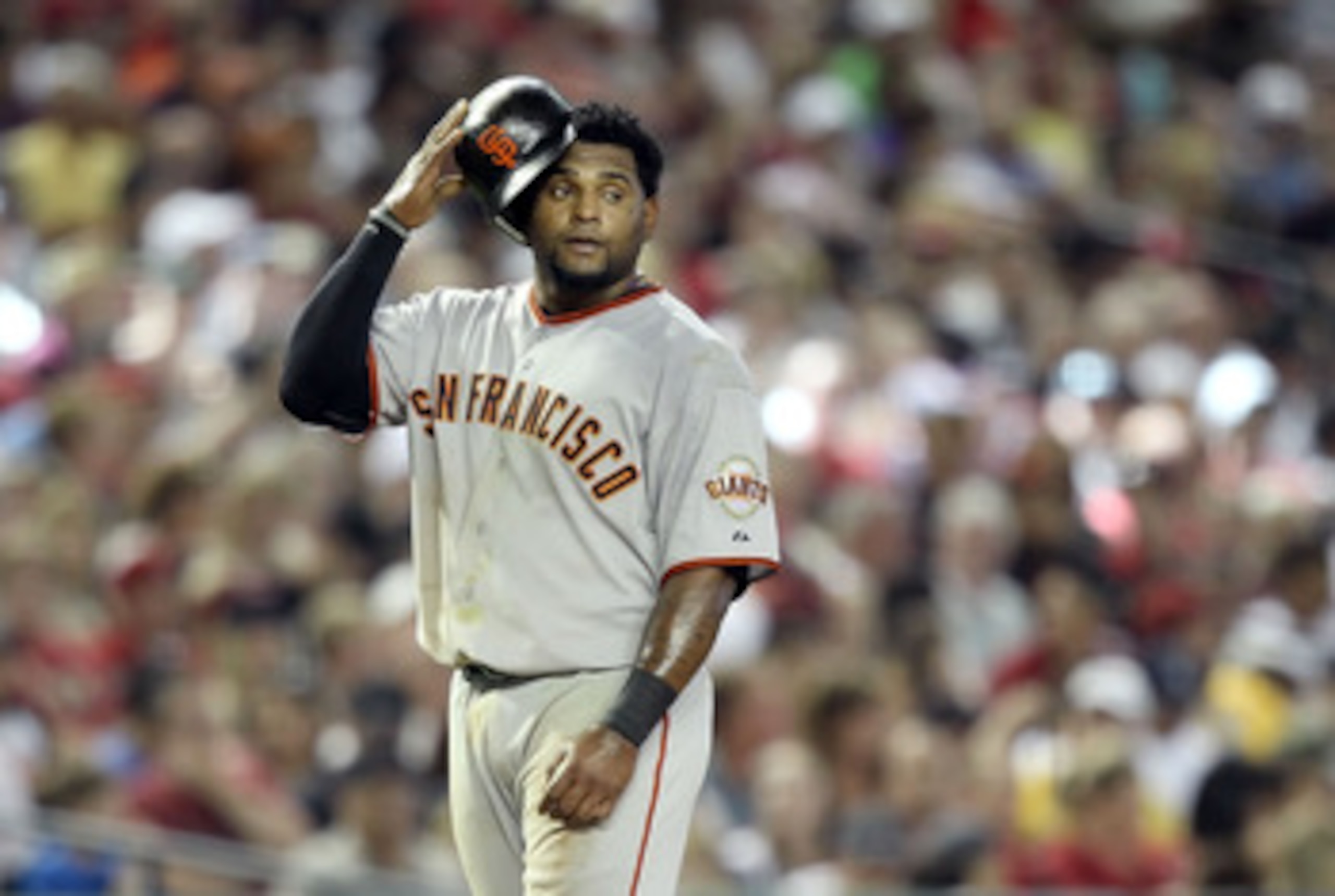 PHOENIX, AZ - APRIL 17:  Pablo Sandoval #48 of the San Francisco Giants leads off third base during the Major League Baseball game against the Arizona Diamondbacks at Chase Field on April 17, 2011 in Phoenix, Arizona. The Diamondbacks defeated the Giants