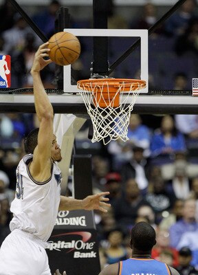 WASHINGTON, DC - MARCH 14: JaVale McGee #34 of the Washington Wizards dunks against the Oklahoma City Thunder during the first half at the Verizon Center on March 14, 2011 in Washington, DC. NOTE TO USER: User expressly acknowledges and agrees that, by do