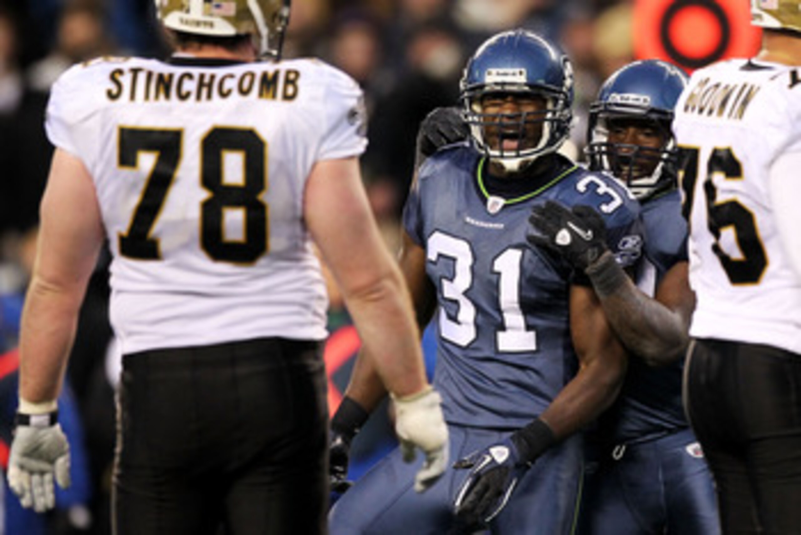 SEATTLE, WA - JANUARY 08: Kam Chancellor #31 of the Seattle Seahawks reacts as Jonathan Stinchcomb #78 of the New Orleans Saints looks on during the 2011 NFC wild-card playoff game at Qwest Field on January 8, 2011 in Seattle, Washington. (Photo by Otto SEATTLE, WA - JANUARY 08: Kam Chancellor #31 of the Seattle Seahawks reacts as Jonathan Stinchcomb #78 of the New Orleans Saints looks on during the 2011 NFC wild-card playoff game at Qwest Field on January 8, 2011 in Seattle, Washington. (Photo by Otto