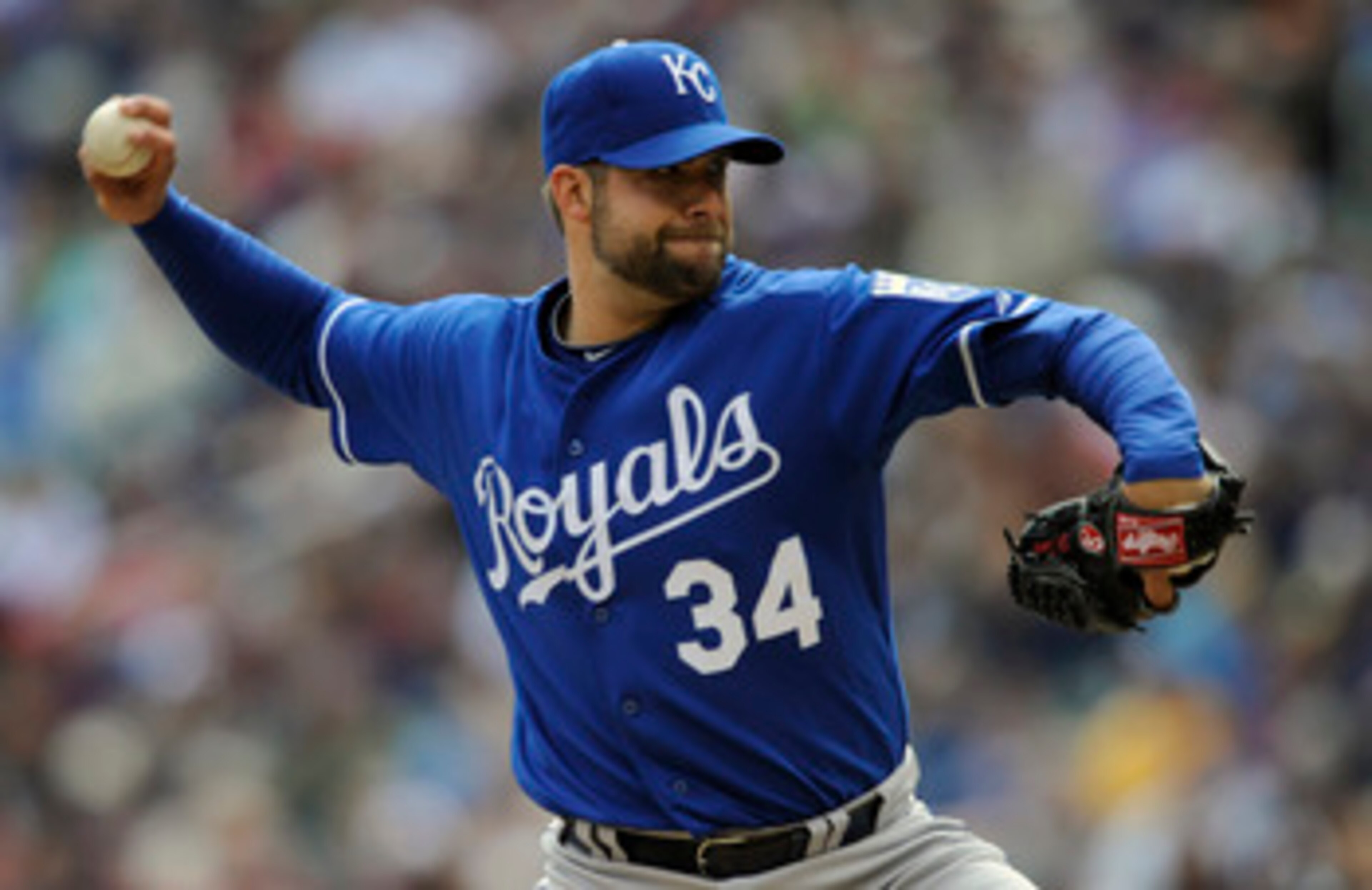 MINNEAPOLIS, MN - APRIL 13:  Kyle Davies #34 of the Kansas City Royals pitches against the Minnesota Twins during the second inning of their game on April 13, 2011 at Target Field in Minneapolis, Minnesota. (Photo by Hannah Foslien/Getty Images)