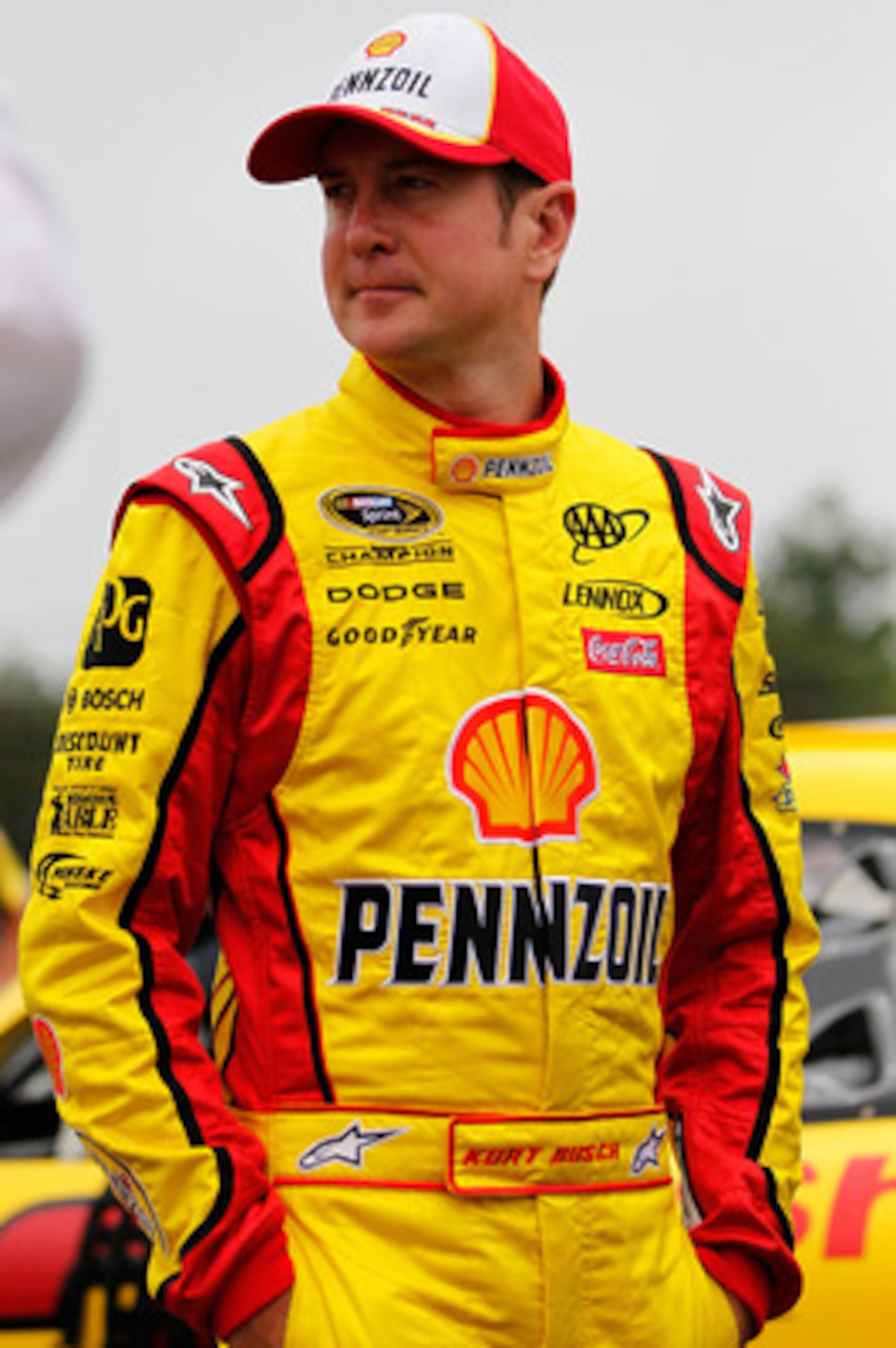 LONG POND, PA - JUNE 12: Kurt Busch, driver of the #22 Shell/Pennzoil Dodge, stands on the grid prior to the NASCAR Sprint Cup Series 5-Hour Energy 500 at Pocono Raceway on June 12, 2011 in Long Pond, Pennsylvania. (Photo by Geoff Burke/Getty Images for LONG POND, PA - JUNE 12: Kurt Busch, driver of the #22 Shell/Pennzoil Dodge, stands on the grid prior to the NASCAR Sprint Cup Series 5-Hour Energy 500 at Pocono Raceway on June 12, 2011 in Long Pond, Pennsylvania. (Photo by Geoff Burke/Getty Images for