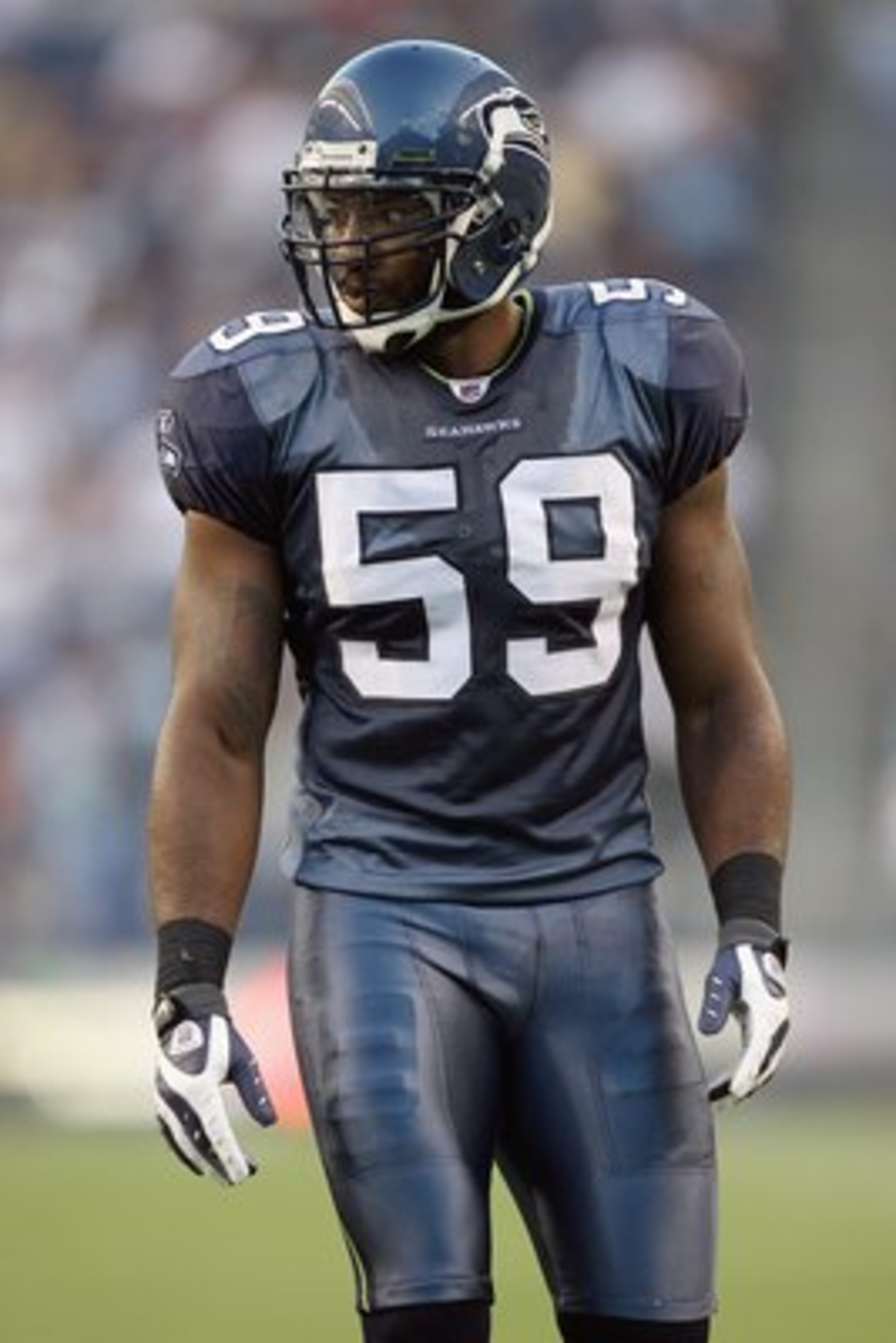 SEATTLE - SEPTEMBER 03:  Arron Curry #59 of the Seattle Seahawks moves on the field during the game against the Oakland Raiders on September 3, 2009 at Qwest Field in Seattle, Washington. (Photo by Otto Greule Jr/Getty Images)