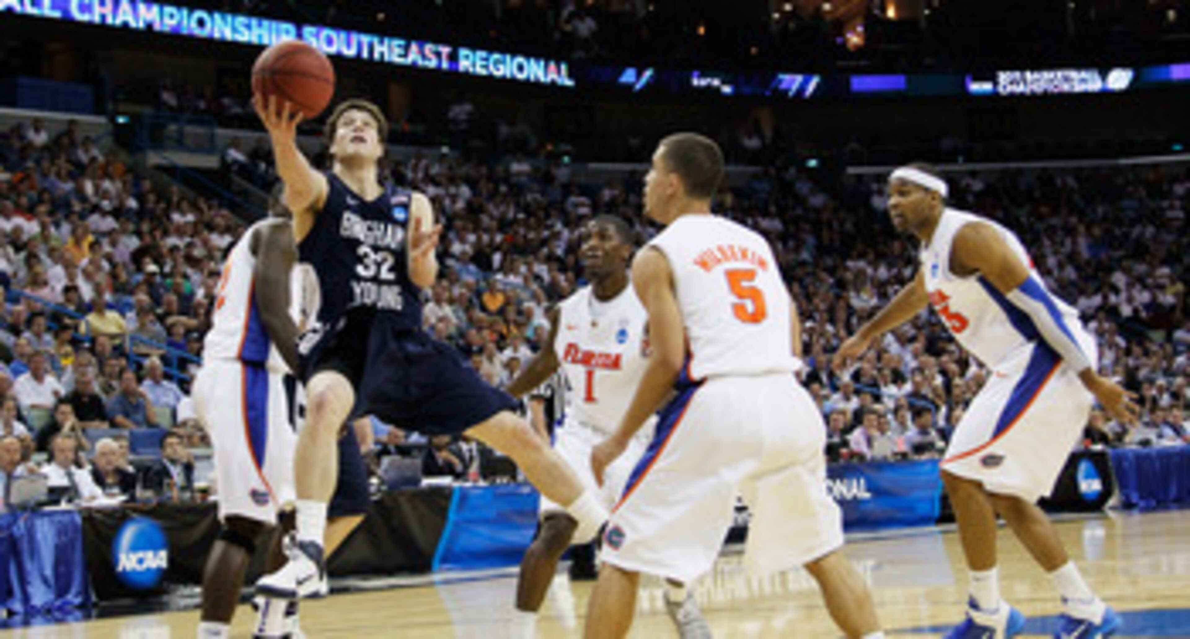 NEW ORLEANS, LA - MARCH 24: Jimmer Fredette #32 of the Brigham Young Cougars shoots against the Florida Gators during the Southeast regional of the 2011 NCAA men's basketball tournament at New Orleans Arena on March 24, 2011 in New Orleans, Louisiana. ( NEW ORLEANS, LA - MARCH 24: Jimmer Fredette #32 of the Brigham Young Cougars shoots against the Florida Gators during the Southeast regional of the 2011 NCAA men's basketball tournament at New Orleans Arena on March 24, 2011 in New Orleans, Louisiana. (