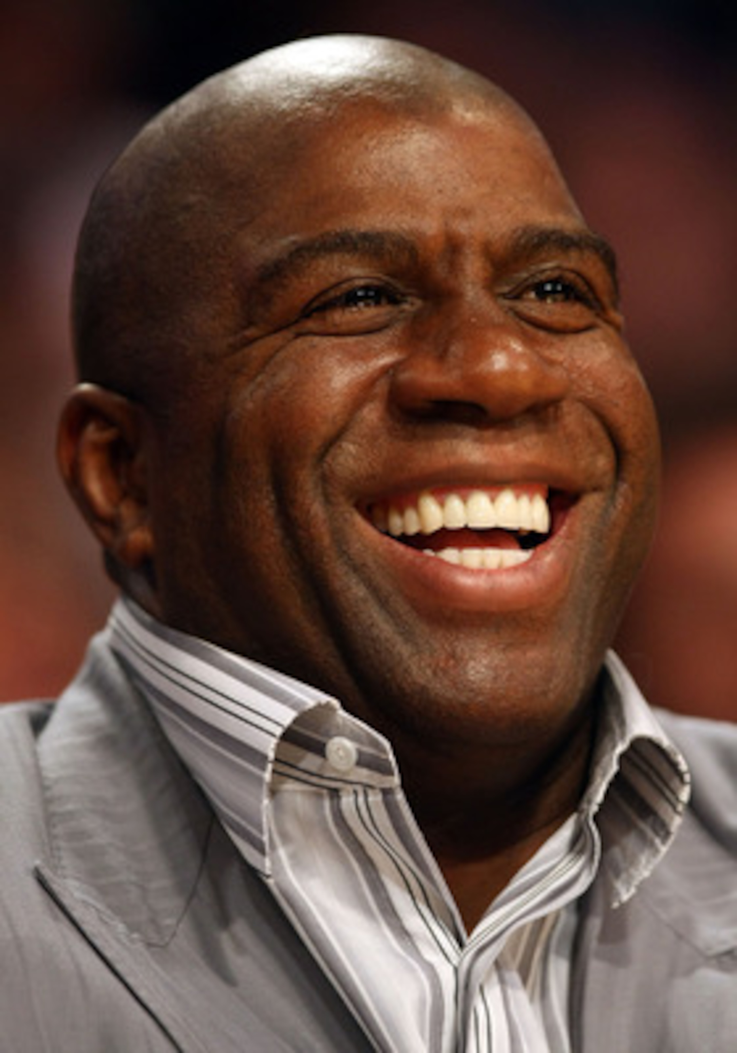 LOS ANGELES, CA - JUNE 10:  NBA legend Earvin 'Magic' Johnson smiles while watching Game Three of the 2008 NBA Finals between the Los Angeles Lakers and the Boston Celtics on June 10, 2008 at Staples Center in Los Angeles, California. NOTE TO USER: User e