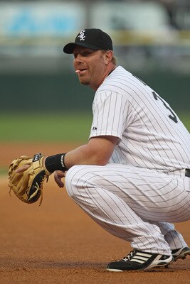 CHICAGO, IL - JUNE 06: Adam Dunn #32 of the Chicago White Sox talks with members of the Seattle Mariners before the start of a game at U.S. Cellular Field on June 6, 2011 in Chicago, Illinois. The White Sox defeated the Mariners 3-1. (Photo by Jonathan Da