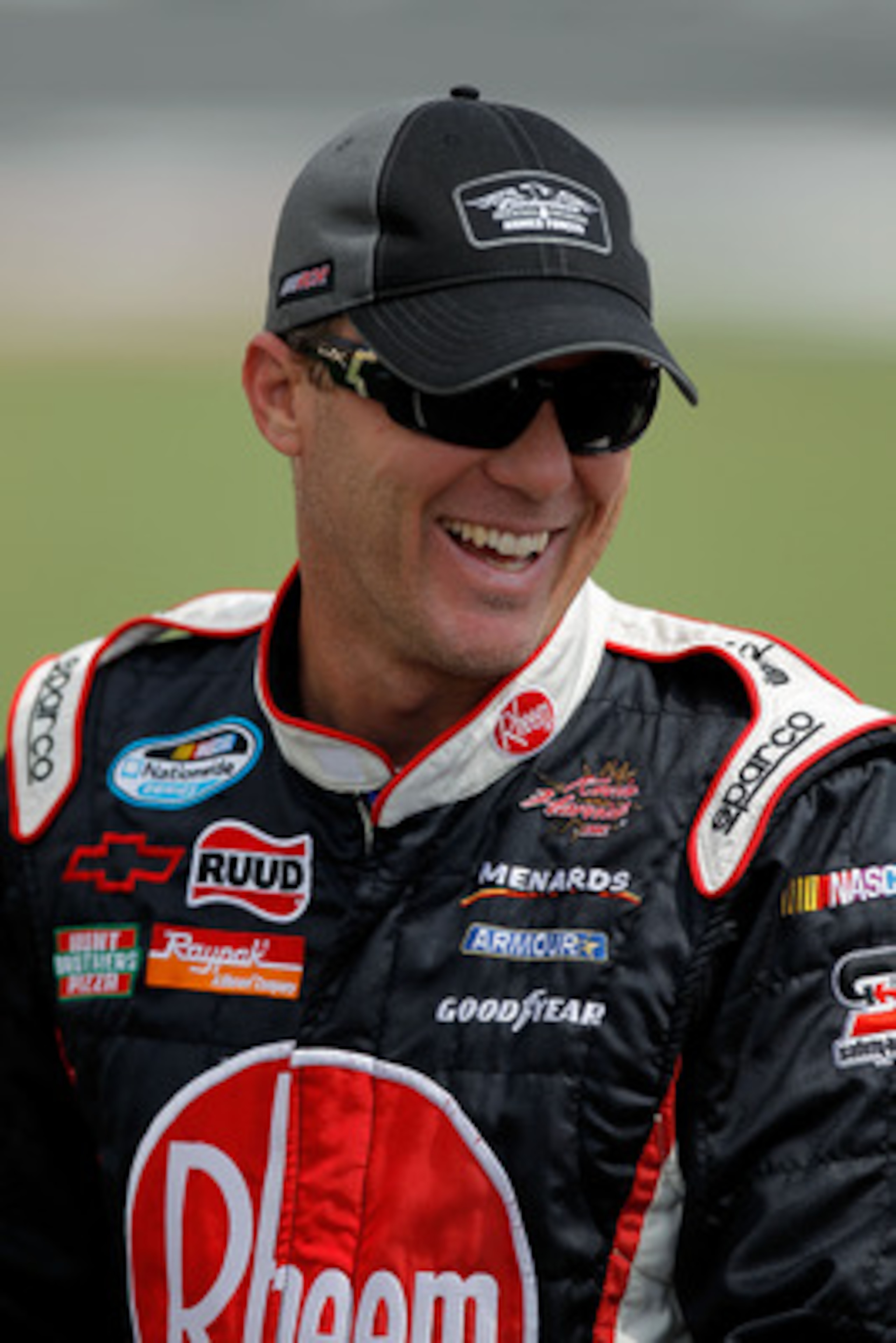 CHARLOTTE, NC - MAY 28: Kevin Harvick, driver of the #33 Rheem Tankless Water Heaters Chevrolet, stands on the grid during qualifying for the NASCAR Nationwide Series Top Gear 300 at Charlotte Motor Speedway on May 28, 2011 in Charlotte, North Carolina. CHARLOTTE, NC - MAY 28: Kevin Harvick, driver of the #33 Rheem Tankless Water Heaters Chevrolet, stands on the grid during qualifying for the NASCAR Nationwide Series Top Gear 300 at Charlotte Motor Speedway on May 28, 2011 in Charlotte, North Carolina.