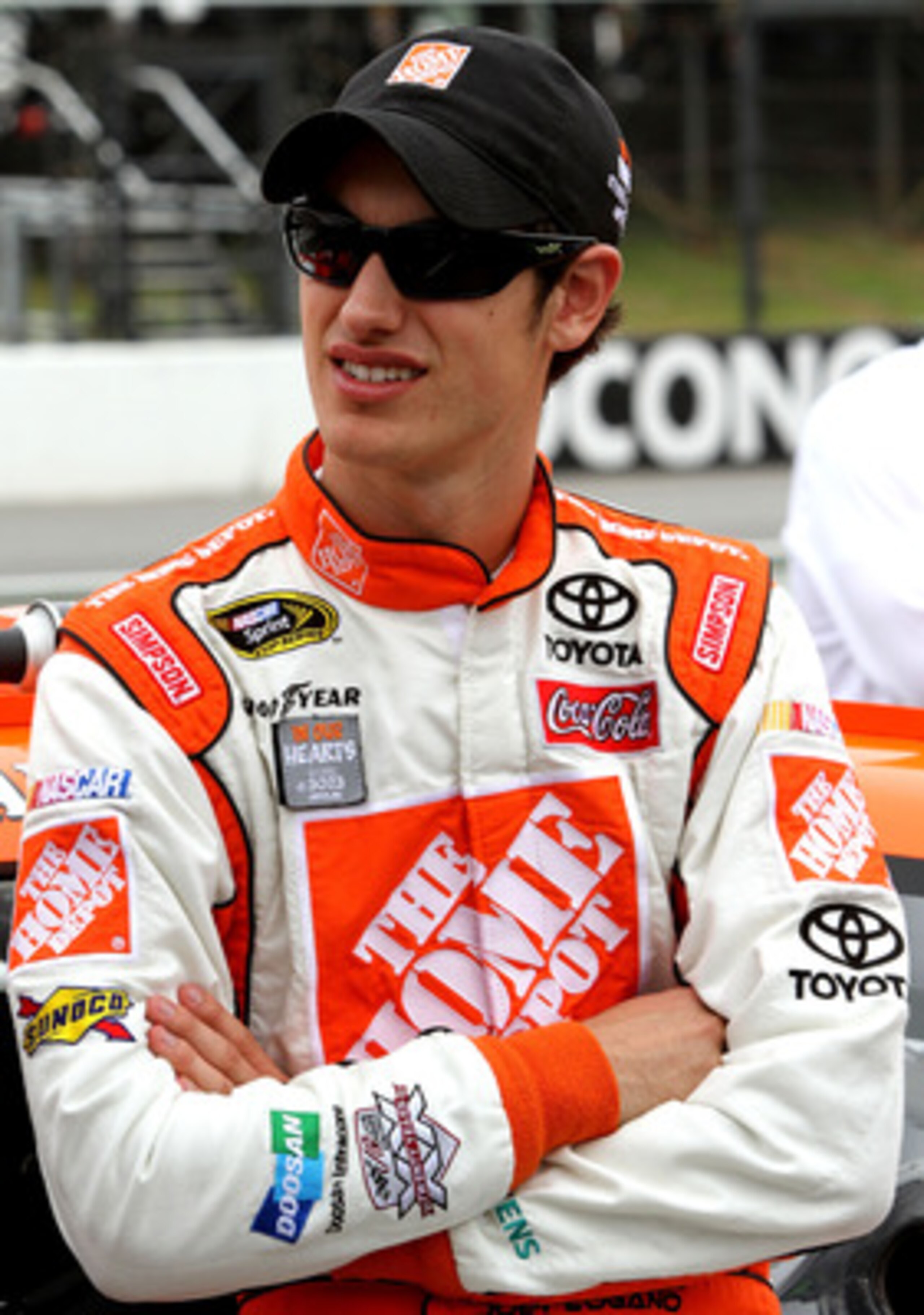 LONG POND, PA - JUNE 12: Joey Logano, driver of the #20 The Home Depot Toyota, stands on the grid prior to the NASCAR Sprint Cup Series 5-Hour Energy 500 at Pocono Raceway on June 12, 2011 in Long Pond, Pennsylvania. (Photo by Jerry Markland/Getty Image LONG POND, PA - JUNE 12: Joey Logano, driver of the #20 The Home Depot Toyota, stands on the grid prior to the NASCAR Sprint Cup Series 5-Hour Energy 500 at Pocono Raceway on June 12, 2011 in Long Pond, Pennsylvania. (Photo by Jerry Markland/Getty Image
