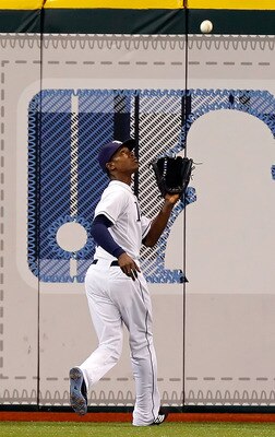 ST. PETERSBURG, FL - JUNE 15:  Outfielder B.J. Upton #2 of the Tampa Bay Rays catches a fly ball against the Boston Red Sox during the game at Tropicana Field on June 15, 2011 in St. Petersburg, Florida.  (Photo by J. Meric/Getty Images)