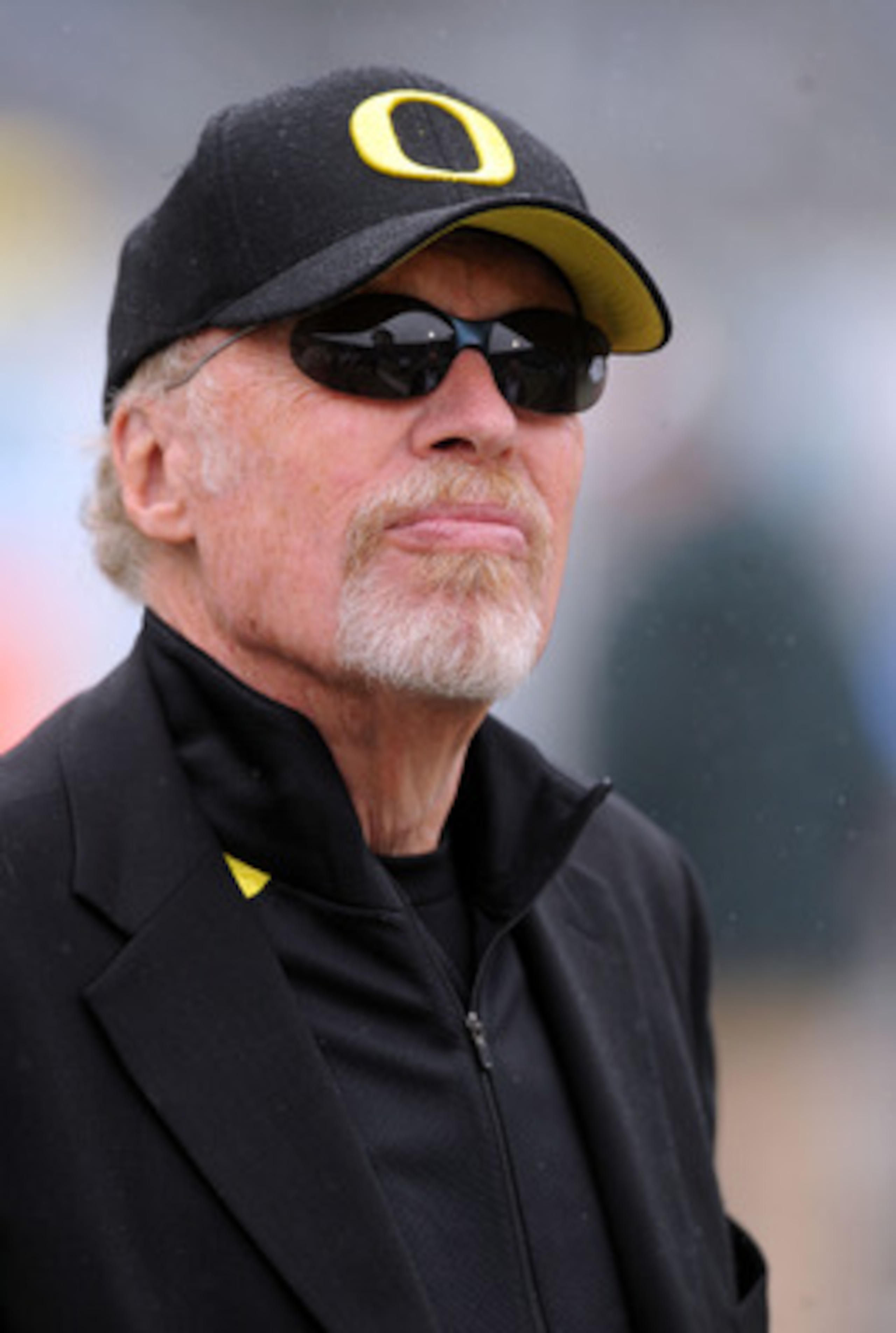 EUGENE, OR - SEPTEMBER 19: Nike owner Phil Knight watches warm ups before the game between the Utah Utes and the Oregon Ducks at Autzen Stadium on September 19, 2009 in Eugene, Oregon. Oregon won the game 31-24. (Photo by Steve Dykes/Getty Images)
