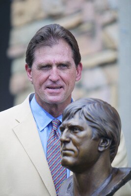 04 Aug 2001 : Jack Youngblood stands next to his bust as he is honored during the 2001 Pro Football Hall Of Fame Induction Ceremony at Hall's Game Day Theater in Canton, Ohio. DIGITAL IMAGE. Mandatory Credit: Tom Pidgeon/Allsport