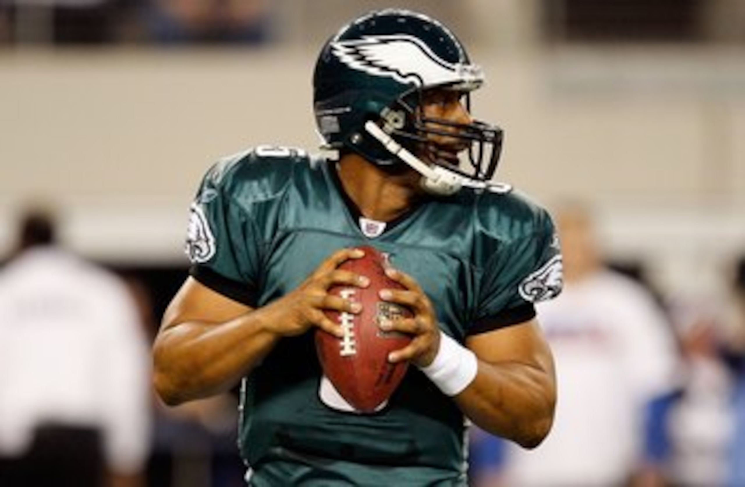 ARLINGTON, TX - JANUARY 09: Quarterback Donovan McNabb #5 of the Philadelphia Eagles during the 2010 NFC wild-card playoff game at Cowboys Stadium on January 9, 2010 in Arlington, Texas. (Photo by Ronald Martinez/Getty Images) ARLINGTON, TX - JANUARY 09: Quarterback Donovan McNabb #5 of the Philadelphia Eagles during the 2010 NFC wild-card playoff game at Cowboys Stadium on January 9, 2010 in Arlington, Texas. (Photo by Ronald Martinez/Getty Images)