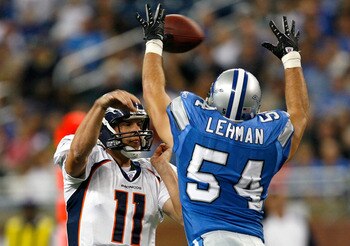 DETROIT - NOVEMBER 04:  Quarterback Patrick Ramsey #11 of the Denver Broncos is pressured by linebacker Teddy Lehman #54 of the Detroit Lions during the second half at Ford Field November 4, 2007 in Detroit, Michigan.  Detroit defeated Denver 44-7.  (Phot
