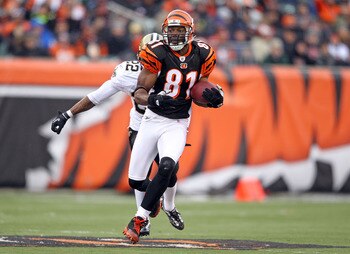 CINCINNATI, OH - DECEMBER 05: Terrell Owens #81 of the Cincinnati Bengals runs with the ball during the NFL game against the New Orleans Saints at Paul Brown Stadium on December 5, 2010 in Cincinnati, Ohio.  The Saints won 34-30.  (Photo by Andy Lyons/Get