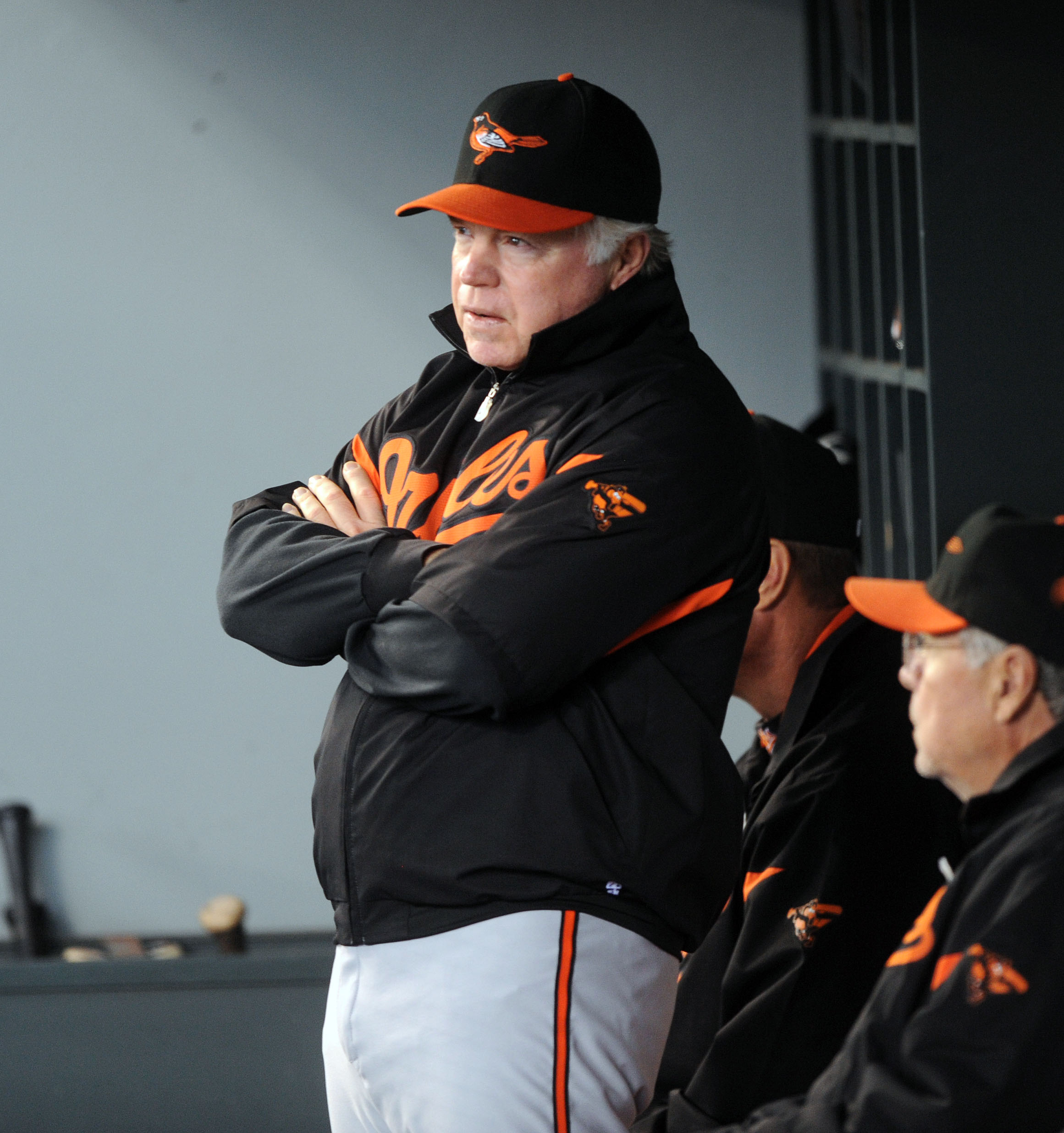 SEATTLE, WA - JUNE 1: Buck Showalter, manager of the Baltimore Orioles confers with his coaches during the game against the Seattle Mariners at Safeco Field on June 1, 2011 in Seattle, Washington. The Baltimore Orioles defeated the Seattle Mariners, 2-1.