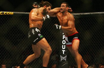 MANCHESTER, UNITED KINGDOM - APRIL 21: Andrei Arlovski of USA and Fabricio Werdum of Brazil in action during a Heavyweight bout of the Ultimate Fighting Championship at the Manchester Evening News Arena on April 21, 2007 in Manchester, England (Photo by G