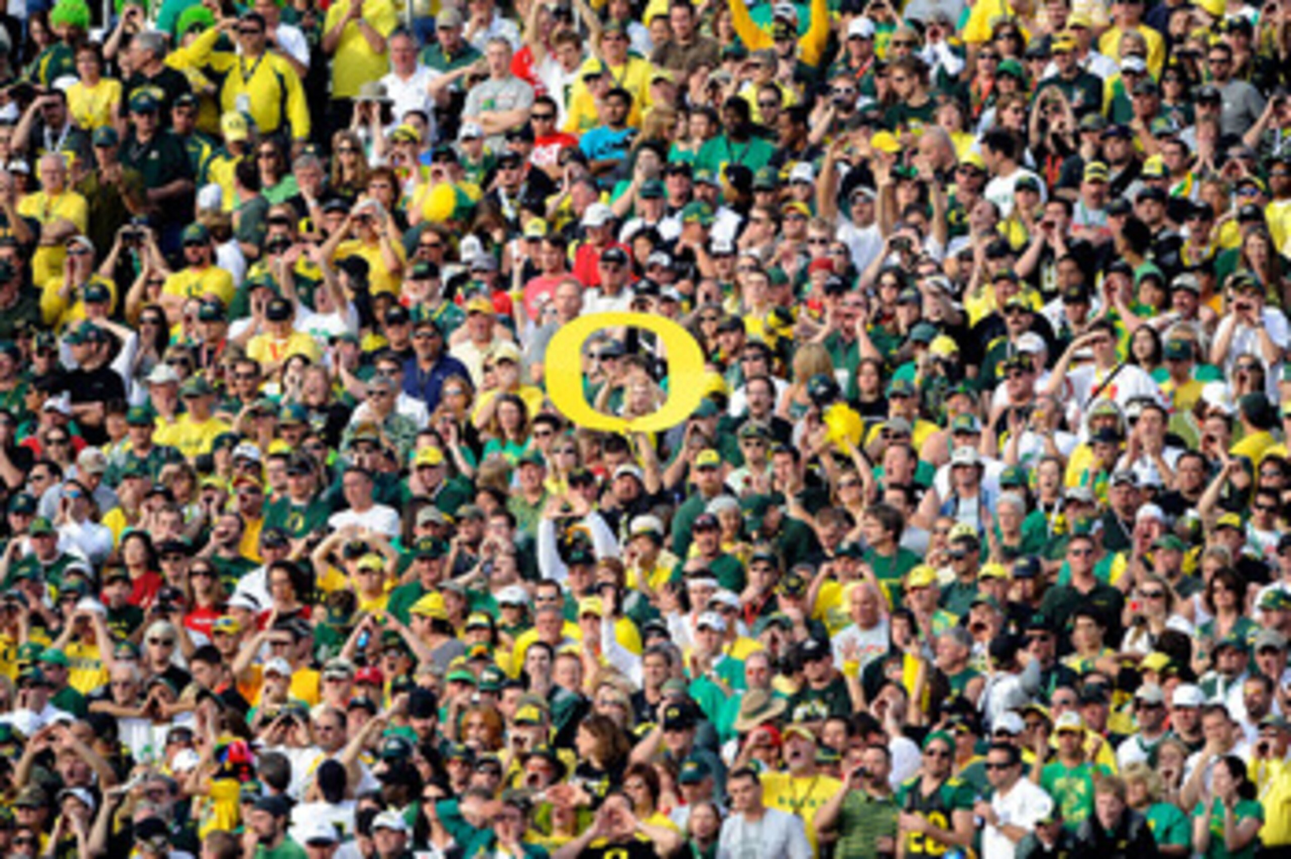 PASADENA, CA - JANUARY 01:  A view of fans of the Oregon Ducks during the 96th Rose Bowl game against the Ohio State Buckeyes on January 1, 2010 in Pasadena, California.  (Photo by Kevork Djansezian/Getty Images)
