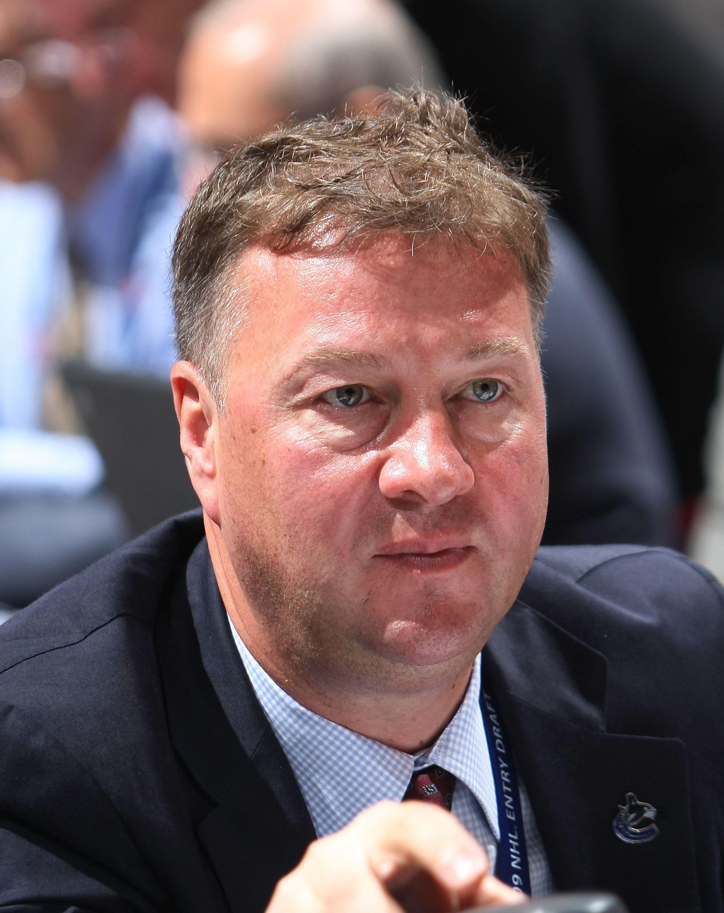 MONTREAL, QC - JUNE 27: Mike Gillis of the Vancouver Canucks photographed during the 2009 NHL Entry Draft at the Bell Centre on June 27, 2009 in Montreal, Quebec, Canada. (Photo by Bruce Bennett/Getty Images) MONTREAL, QC - JUNE 27: Mike Gillis of the Vancouver Canucks photographed during the 2009 NHL Entry Draft at the Bell Centre on June 27, 2009 in Montreal, Quebec, Canada. (Photo by Bruce Bennett/Getty Images)