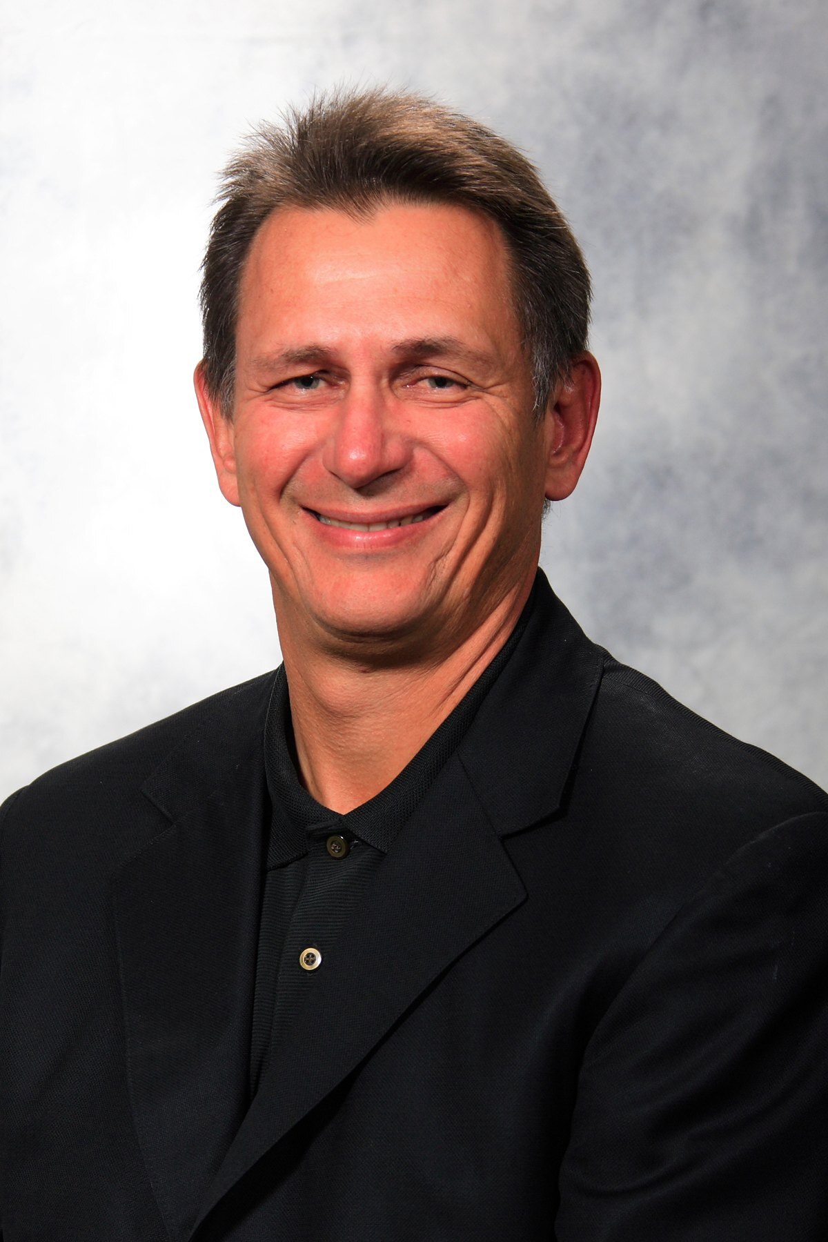 DETROIT - 2007: Ken Holland of the Detroit Red Wings poses for his 2007 NHL headshot at photo day in Detroit, Michigan. (Photo by Getty Images) DETROIT - 2007: Ken Holland of the Detroit Red Wings poses for his 2007 NHL headshot at photo day in Detroit, Michigan. (Photo by Getty Images)