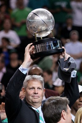 BOSTON - MAY 28: Team president Danny Ainge of the Boston Celtics celebrates with the Eastern COnference trophy after the Celtics won 96-84 against the Orlando Magic in Game Six of the Eastern Conference Finals during the 2010 NBA Playoffs at TD Garden o BOSTON - MAY 28: Team president Danny Ainge of the Boston Celtics celebrates with the Eastern COnference trophy after the Celtics won 96-84 against the Orlando Magic in Game Six of the Eastern Conference Finals during the 2010 NBA Playoffs at TD Garden o