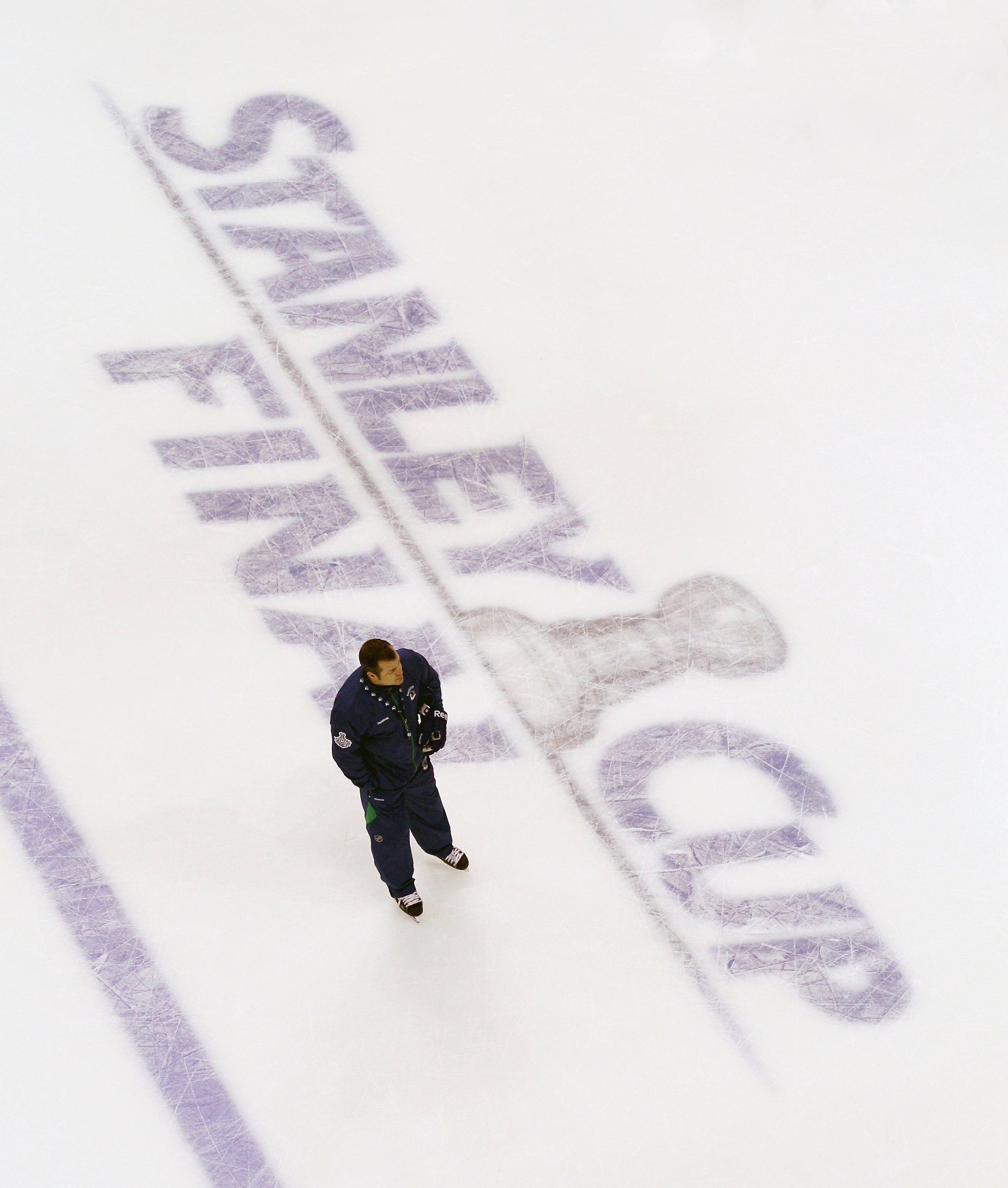 VANCOUVER, BC - MAY 31: Head coach Alain Vigneault of the Vancouver Canucks supervises practice during a practice session the day before the opening game of the 2011 NHL Stanley Cup Finals at the Rogers Arena on May 31, 2011 in Vancouver, Canada. (Photo VANCOUVER, BC - MAY 31: Head coach Alain Vigneault of the Vancouver Canucks supervises practice during a practice session the day before the opening game of the 2011 NHL Stanley Cup Finals at the Rogers Arena on May 31, 2011 in Vancouver, Canada. (Photo