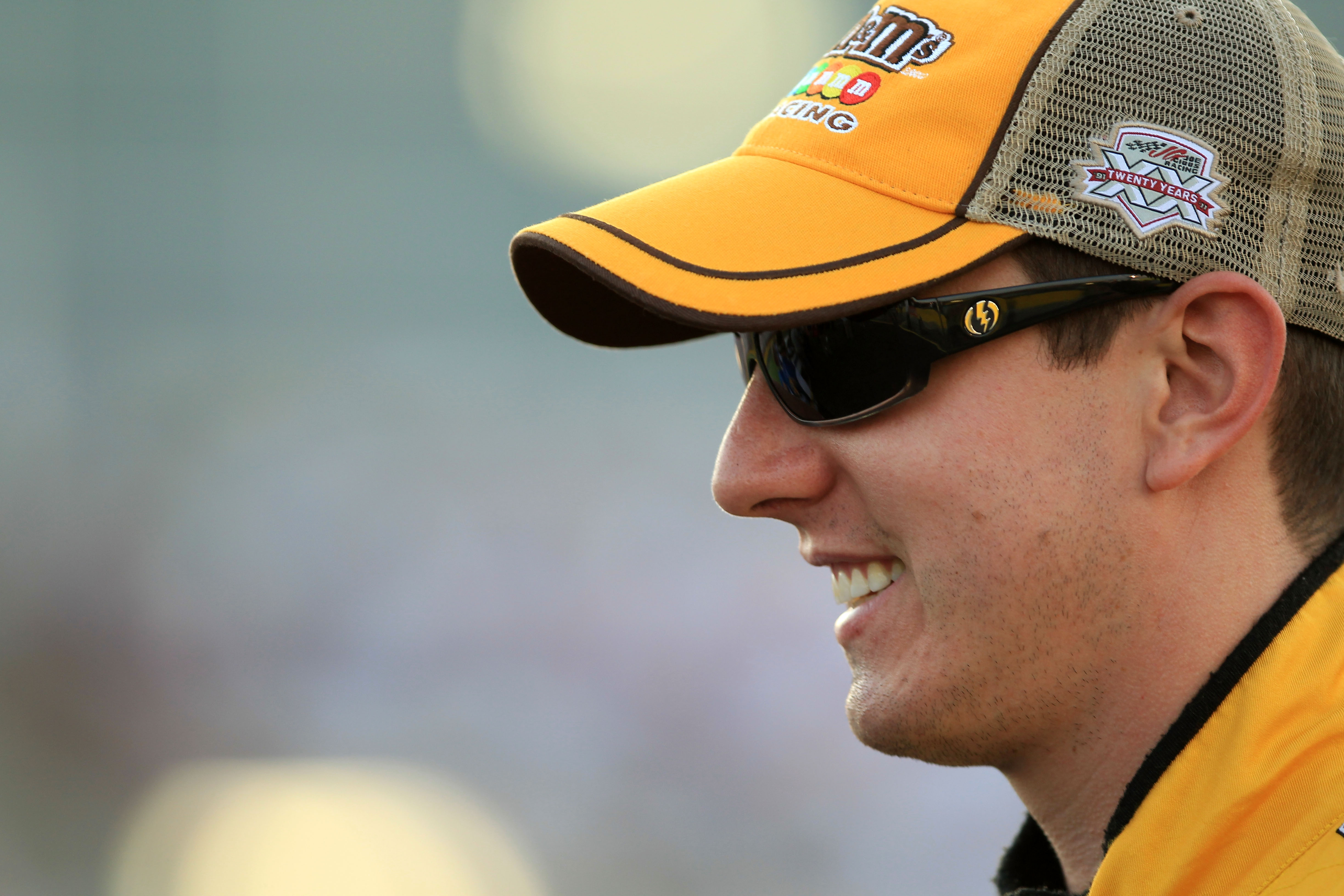 CHARLOTTE, NC - MAY 26:  Kyle Busch, driver of the #18 M&M's Toyota, stands on the grid during qualifying for the NASCAR Sprint Cup Series Coca-Cola 600 at Charlotte Motor Speedway on May 26, 2011 in Charlotte, North Carolina.  (Photo by Streeter Lecka/Ge