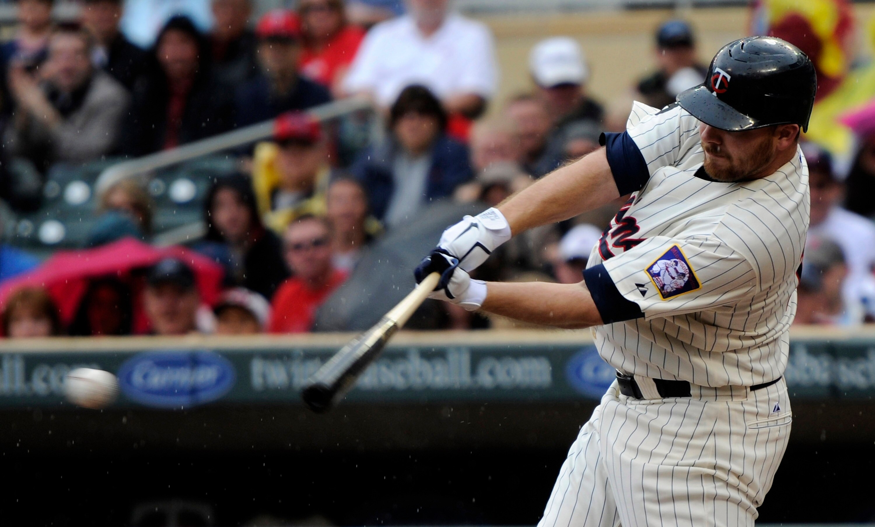 MINNEAPOLIS, MN - MAY 29: Jason Kubel #16 of the Minnesota Twins hits an RBI single against the Los Angeles Angels of Anaheim during the first inning of their game on May 29, 2011 at Target Field in Minneapolis, Minnesota. (Photo by Hannah Foslien/Getty I