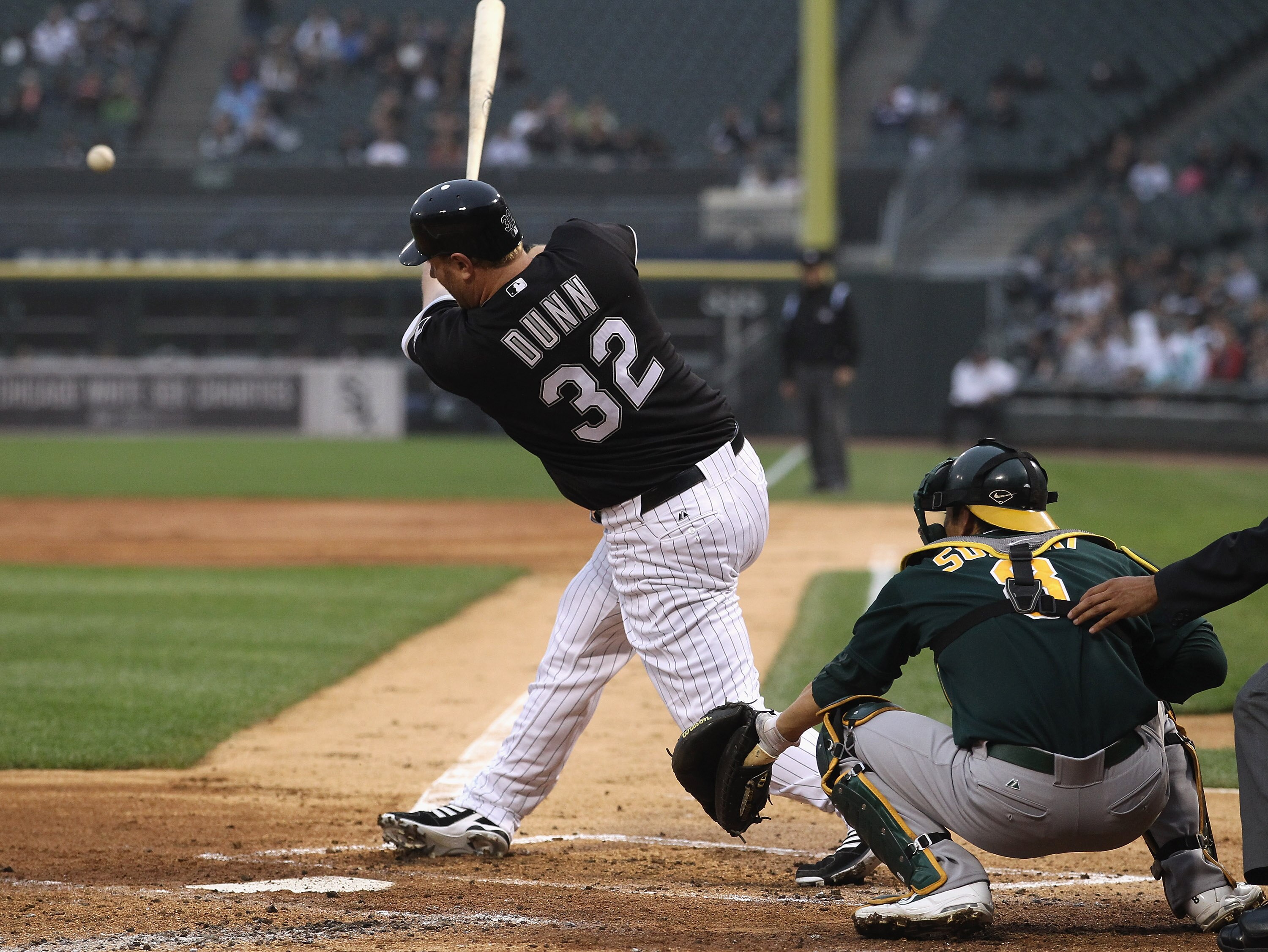 CHICAGO, IL - JUNE 10:  Adam Dunn #32 of the Chicago White Sox hits the ball against the Oakland Athletics at U.S. Cellular Field on June 10, 2011 in Chicago, Illinois. The Athletics defeated the White Sox 7-5.  (Photo by Jonathan Daniel/Getty Images)