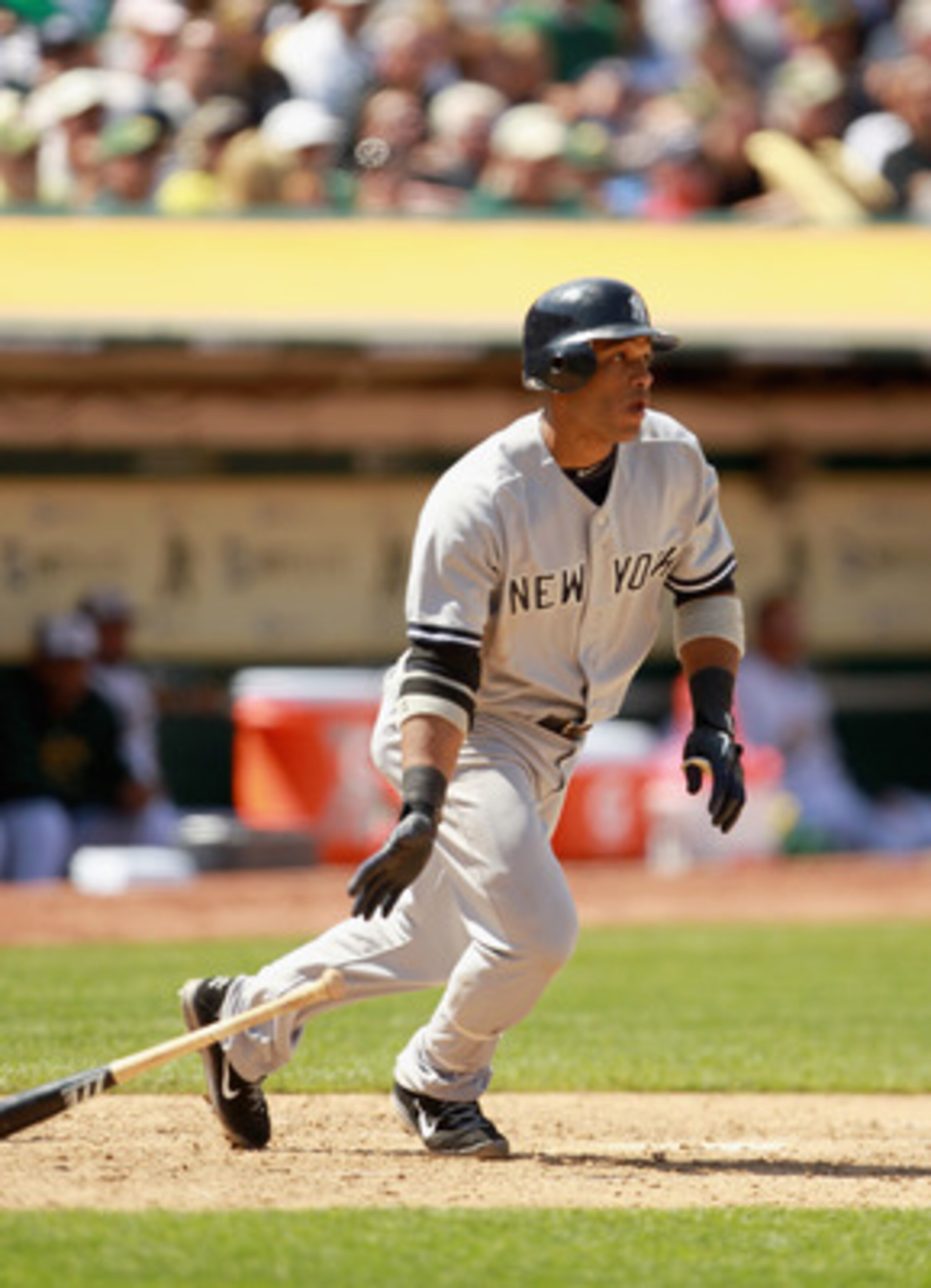 OAKLAND, CA - MAY 30:  Robinson Cano #24 of the New York Yankees bats against the Oakland Athletics at Oakland-Alameda County Coliseum on May 30, 2011 in Oakland, California.  (Photo by Ezra Shaw/Getty Images)