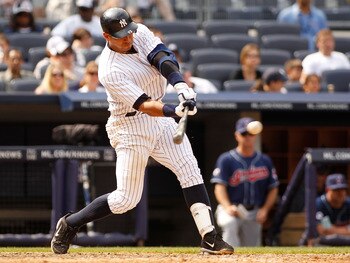 NEW YORK - JUNE 12:  Alex Rodriguez #13 of the New York Yankees hits an RBI single against the Cleveland Indians in the bottom of the eight inning on June 12, 2011 at Yankee Stadium in the Bronx borough of New York City. The Yankees defeated the Indians 9