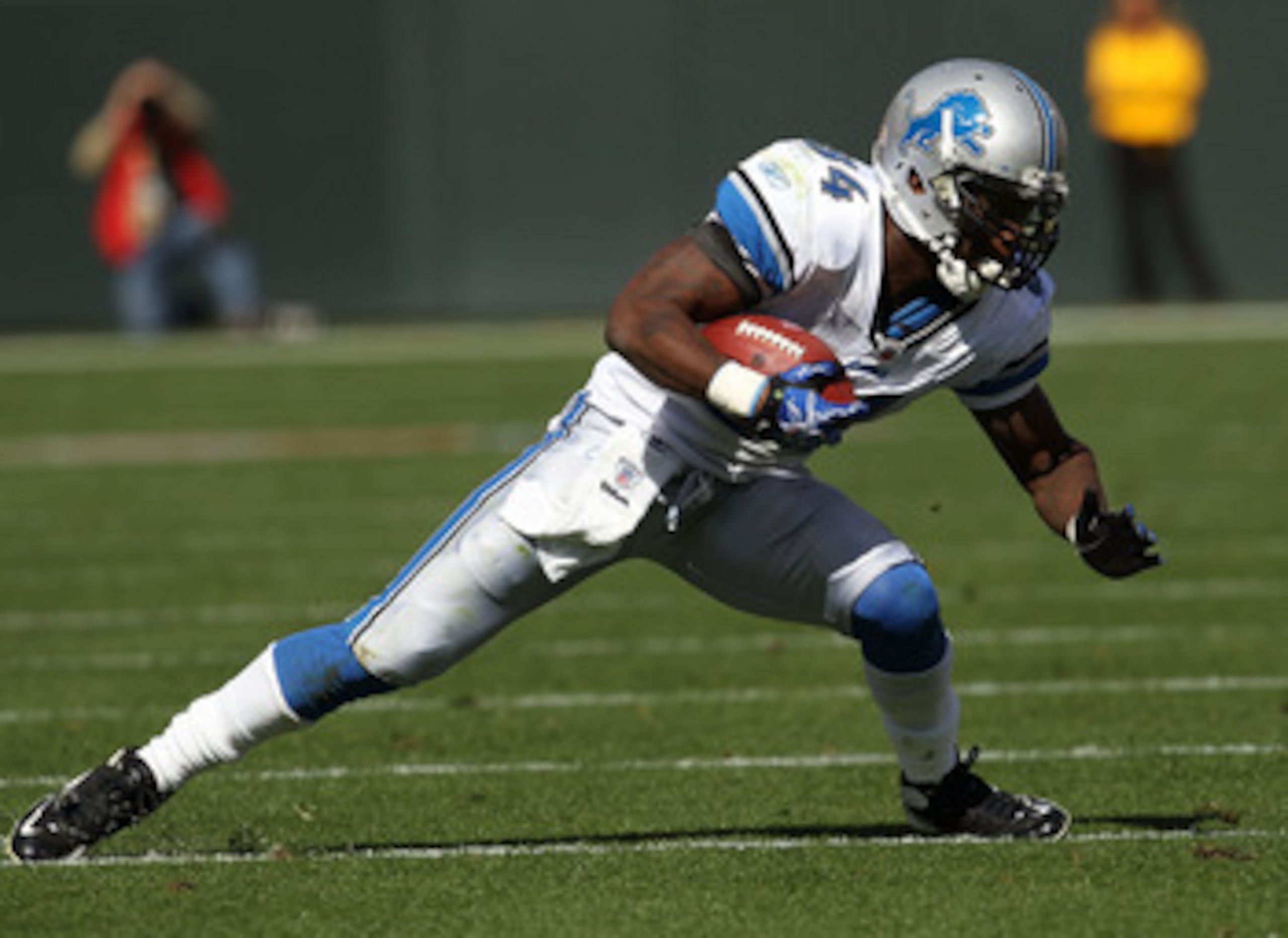 GREEN BAY, WI - OCTOBER 03: Kevin Smith #34 of the Detroit Lions tries to run against the Green Bay Packers at Lambeau Field on October 3, 2010 in Green Bay, Wisconsin. The Packers defeated the Lions 28-26. (Photo by Jonathan Daniel/Getty Images)
