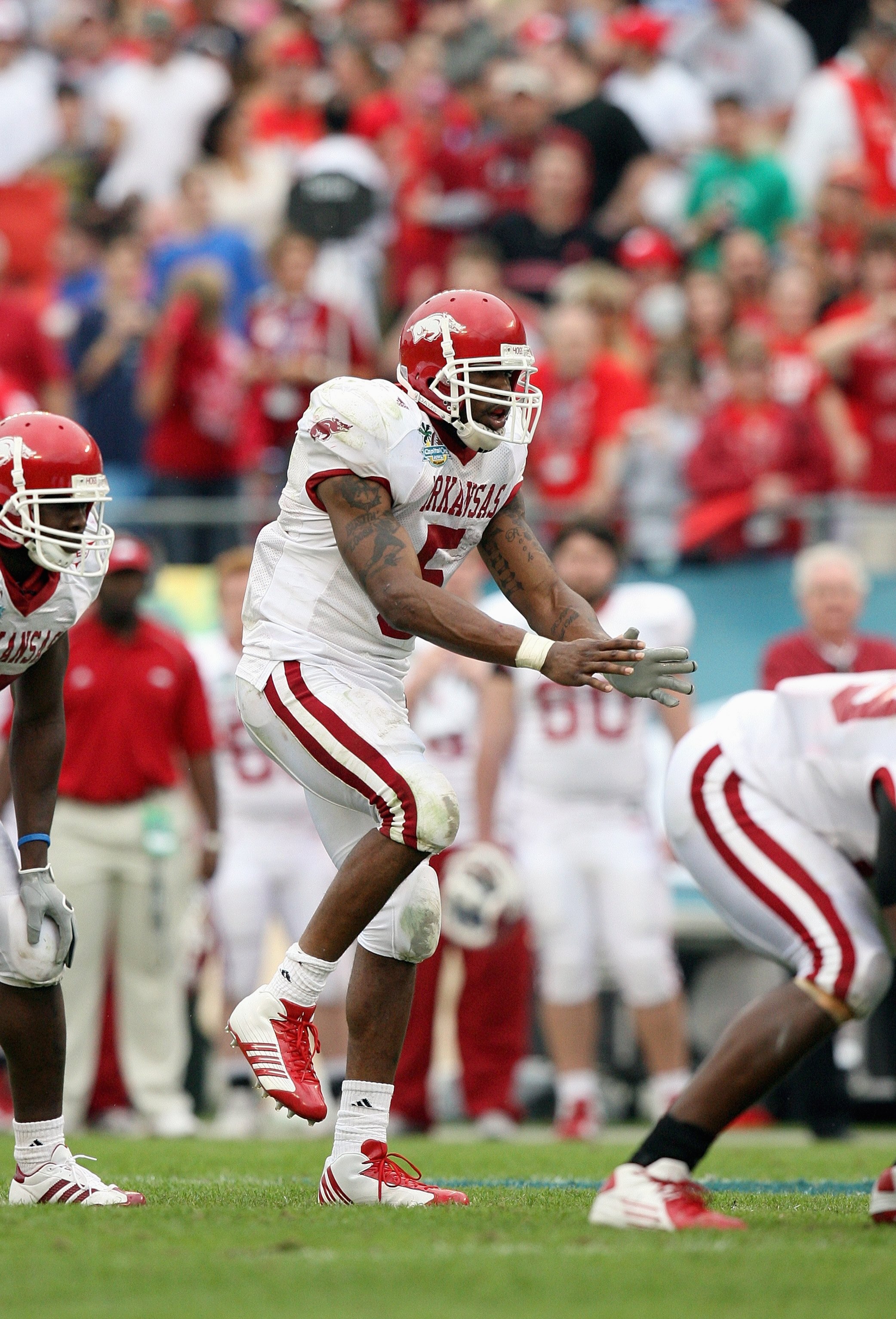 ORLANDO, FL - JANUARY 01: Darren McFadden #5 of the Arkansas Razorbacks moves against the Wisconsin Badgers in the Capitol One Bowl at Florida Citrus Bowl on January 1, 2007 in Orlando, Florida. (Photo by Doug Benc/Getty Images)