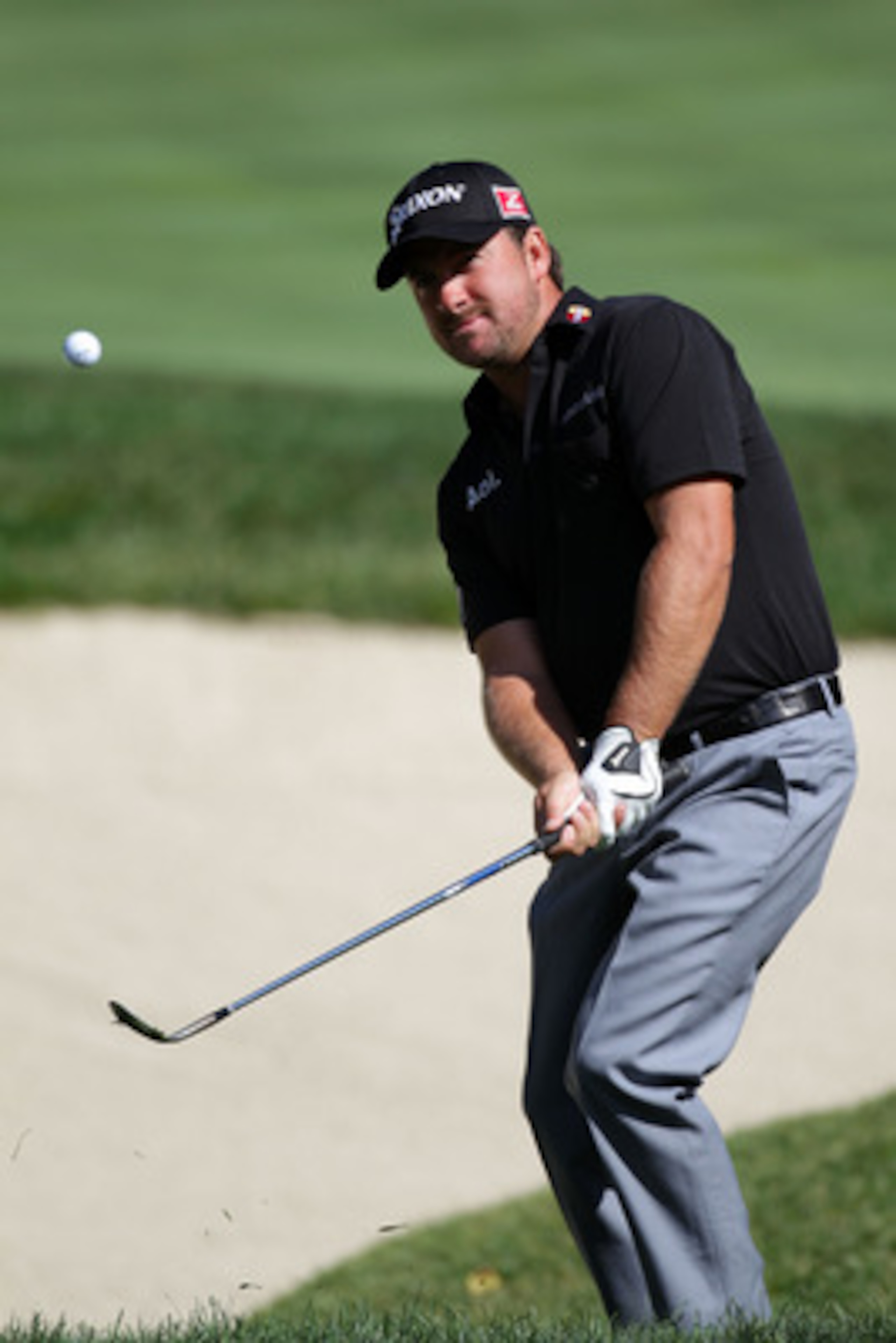 BETHESDA, MD - JUNE 13:  Graeme McDowell of Northern Ireland watches a shot during a practice round prior to the start of the 111th U.S. Open at Congressional Country Club on June 13, 2011 in Bethesda, Maryland.  (Photo by Ross Kinnaird/Getty Images)