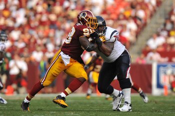 LANDOVER - SEPTEMBER 19:  Brian Orakpo #98 of the Washington Redskins defends against the Houston Texans at FedExField on September 19, 2010 in Landover, Maryland. The Texans defeated the Redskins in overtime 30-27. (Photo by Larry French/Getty Images)