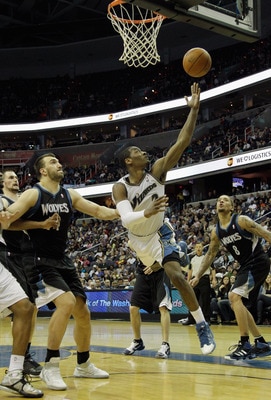 WASHINGTON, DC - MARCH 05:  John Wall #2 of the Washington Wizards puts up a shot against the Minnesota Timberwolves at the Verizon Center on March 5, 2011 in Washington, DC. NOTE TO USER: User expressly acknowledges and agrees that, by downloading and/or