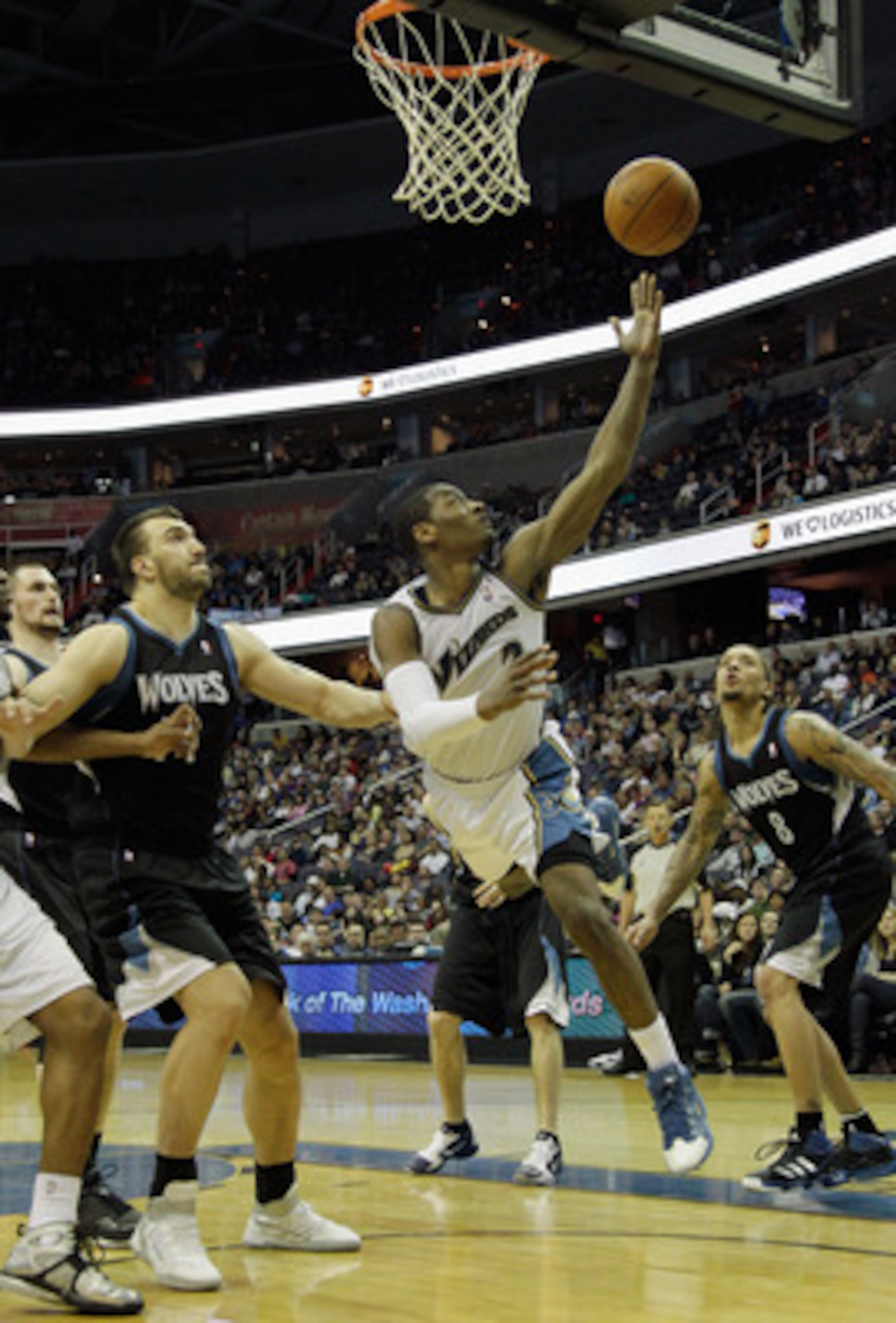 WASHINGTON, DC - MARCH 05:  John Wall #2 of the Washington Wizards puts up a shot against the Minnesota Timberwolves at the Verizon Center on March 5, 2011 in Washington, DC. NOTE TO USER: User expressly acknowledges and agrees that, by downloading and/or