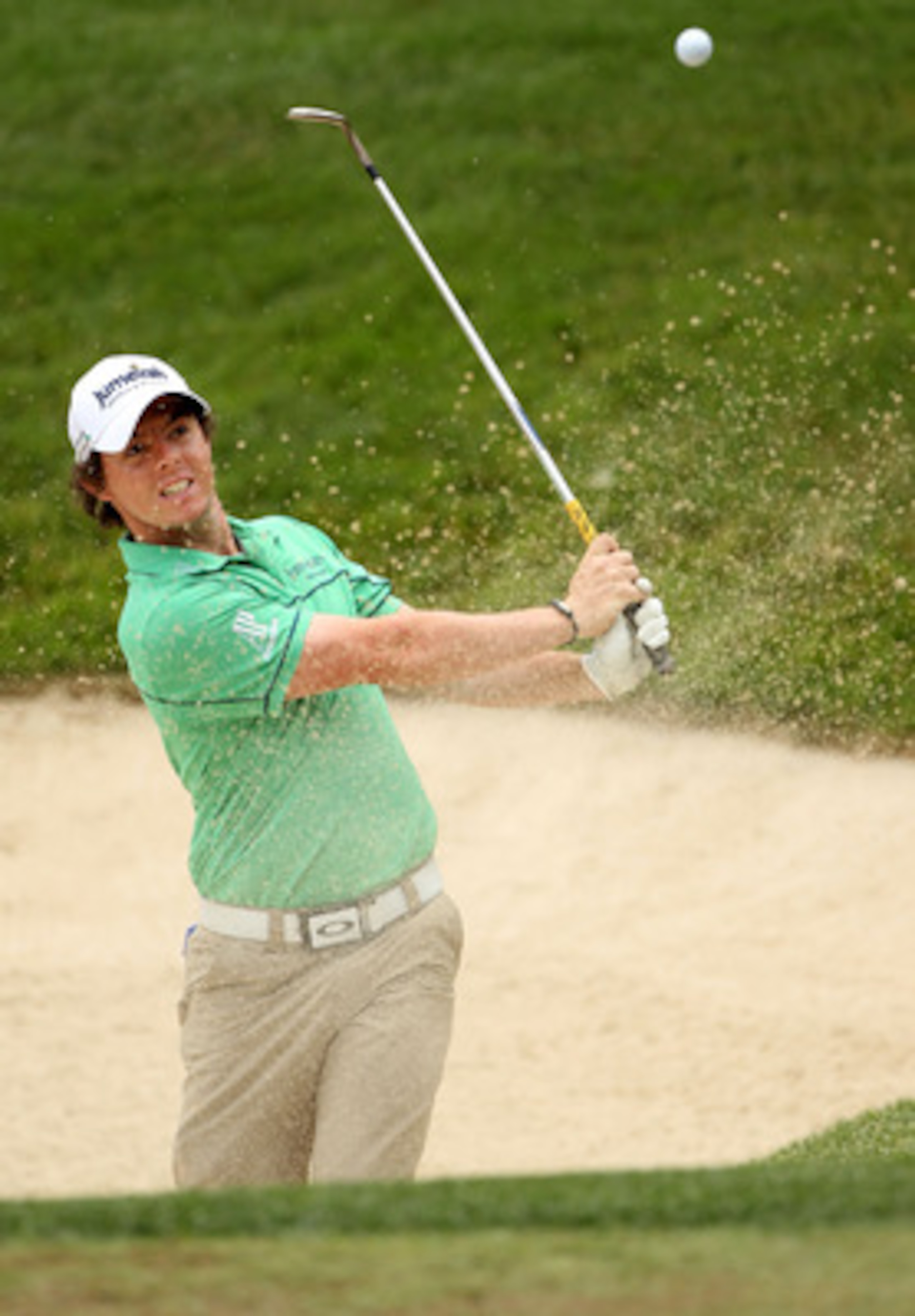 BETHESDA, MD - JUNE 14:  Rory McIlroy of Northern Ireland plays a bunker shot during a practice round prior to the start of the 111th U.S. Open at Congressional Country Club on June 14, 2011 in Bethesda, Maryland.  (Photo by Andrew Redington/Getty Images)
